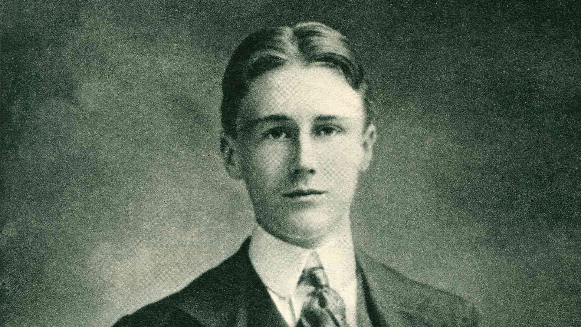 Formal portrait of a teenaged F.D.R. in a suit and tie, with a serious expression on his face