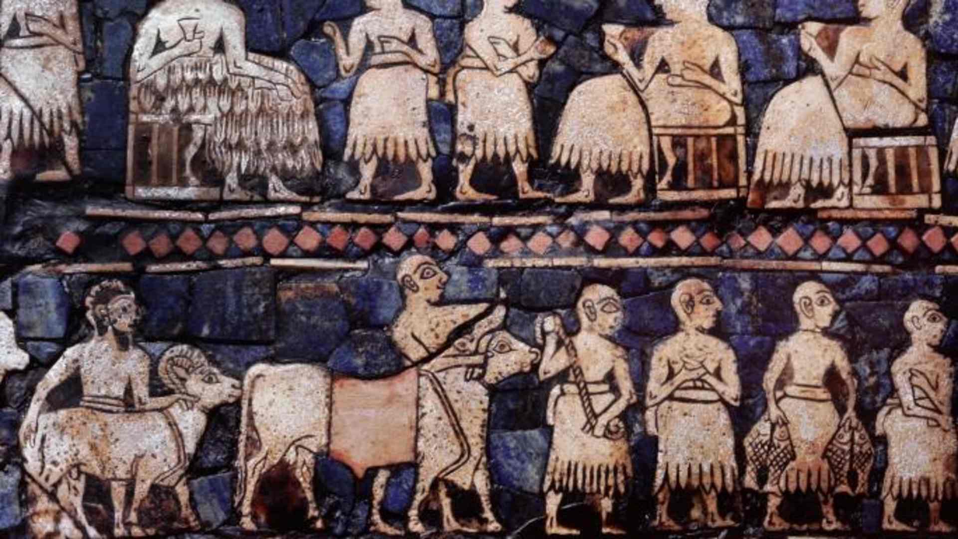 A detail from the so called Standard of Ur, side B. This panel shows a banquet, perhaps after a victory and men driving cattle and sheep.