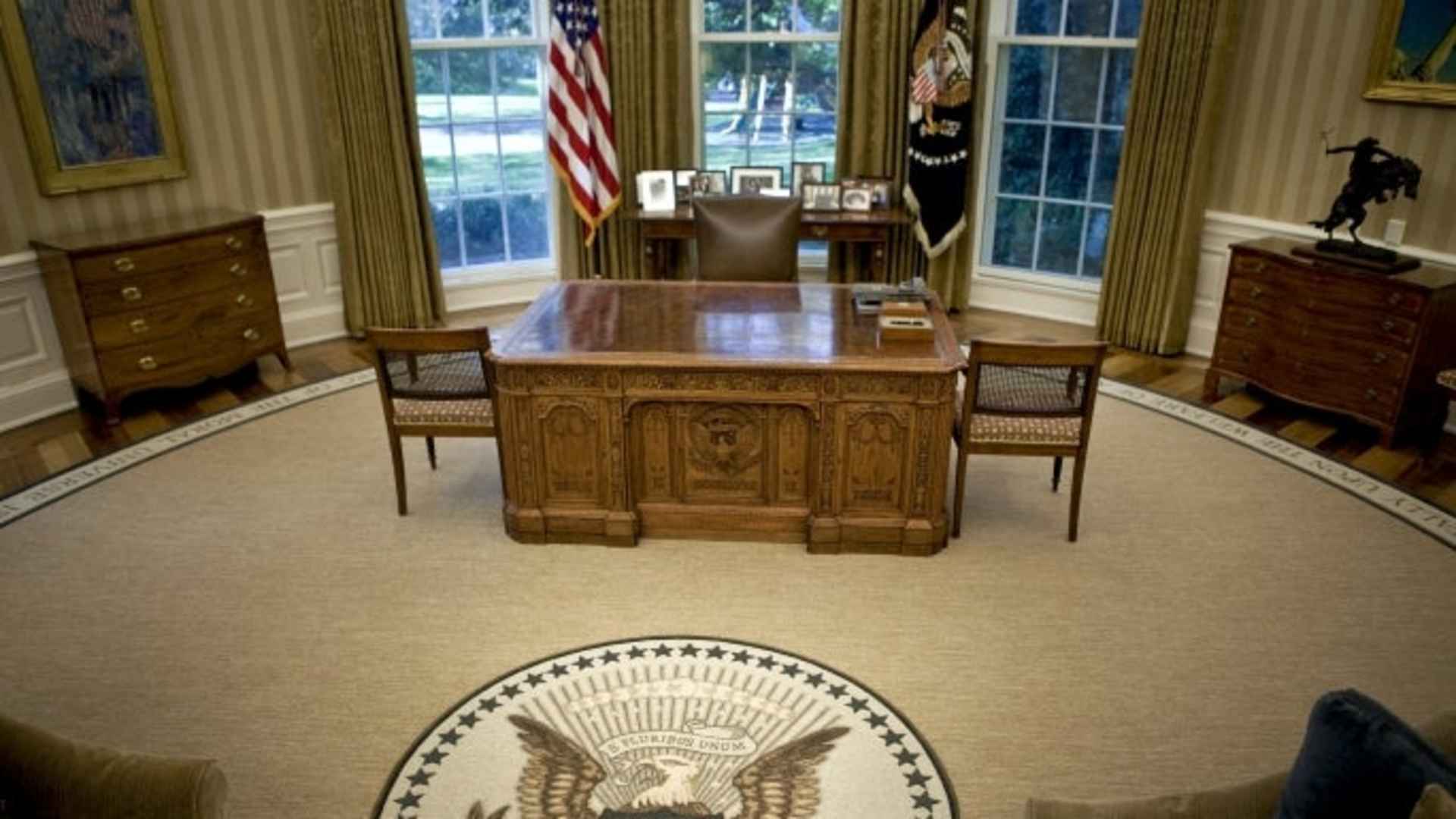 The desk of President Barack Obama sits on top of a new rug in the Oval Office at the White House in Washington, D.C., U.S., on Tuesday, Aug. 31, 2010.