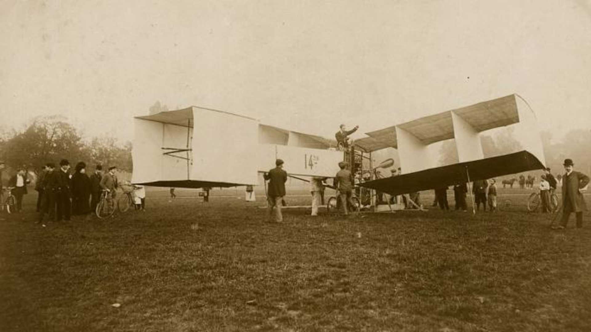 Alberto Santos-Dumont the Brazilian aeronaut aboard his record winning 14 bis tail-first biplane.