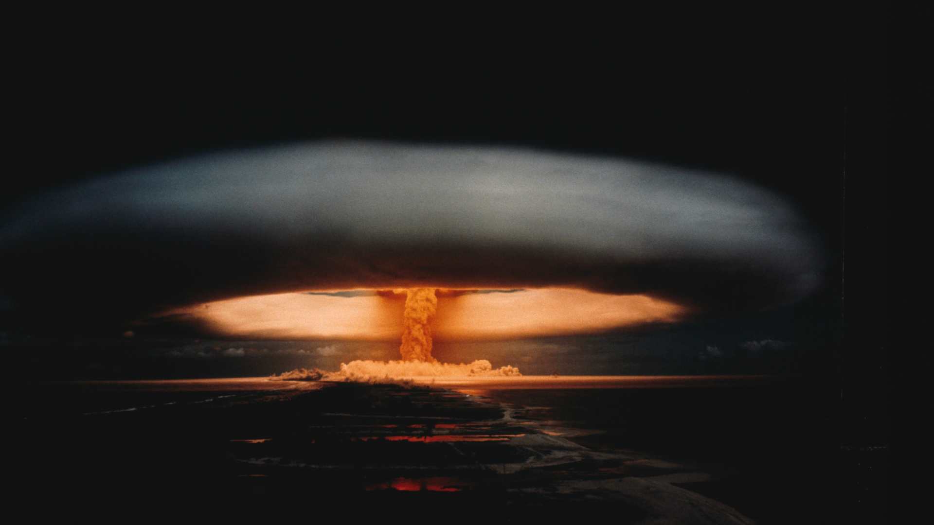 Nuclear explosion and atomic mushroom cloud. the image depicts a nuclear exercise in Mururoa. | Location: Mururoa, French Polynesia, France