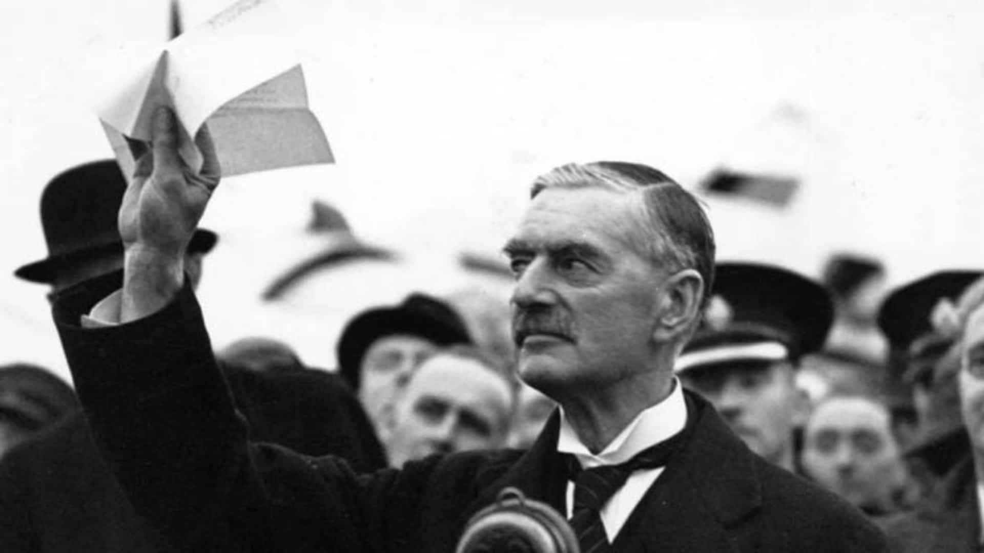 Prime Minister Neville Chamberlain upon his return to London on September 30, 1938.