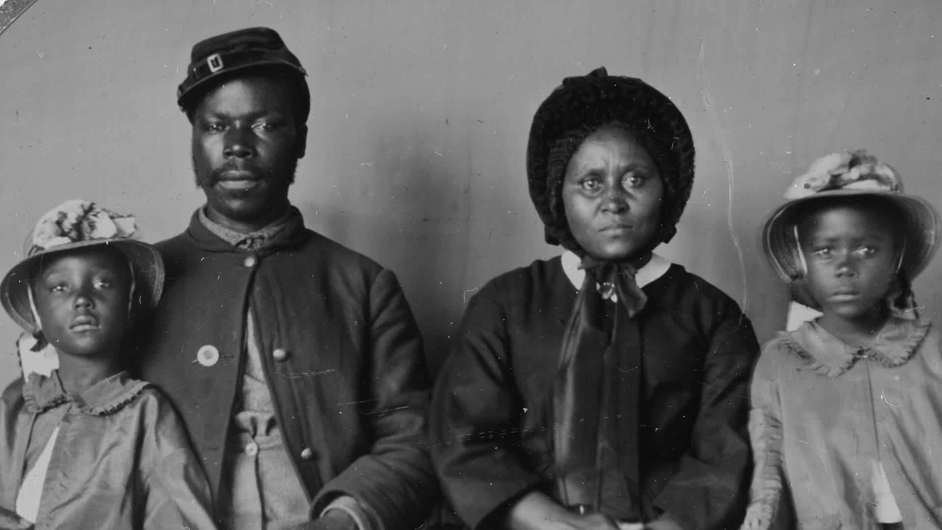 An African American soldier in uniform with his wife and two daughters, circa 1864. This image was found in Cecil County, Maryland, making it likely that this soldier belonged to one of the seven U.S.C.T. regiments raised in Maryland.