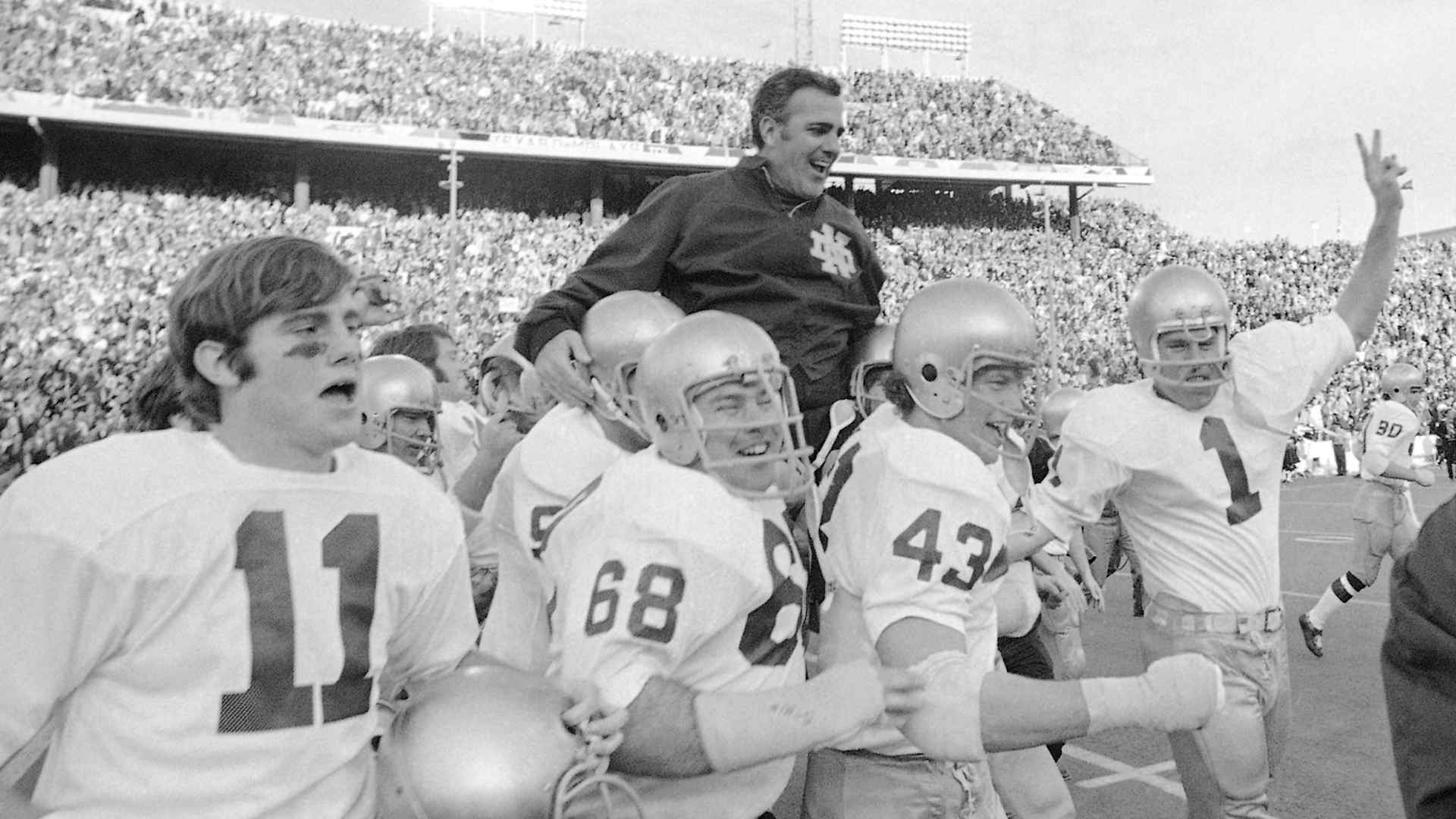 FILE - In this Jan. 1, 1971, file photo, Notre Dame coach Ara Parseghian is carried off the field by his victorious players after the Irish victory over Texas 24-11 in the Cotton Bowl NCAA college football game in Dallas. The Associated Press has been ranking the best teams in college football for the last 80 seasons. (AP Photo/File)