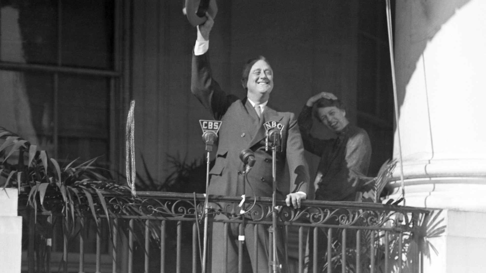 President Roosevelt waving as he greets a crowd of children that was assembled on the White House lawn for the traditional Easter Egg Roll in 1937. (Credit: Bettmann Archive/Getty Images)