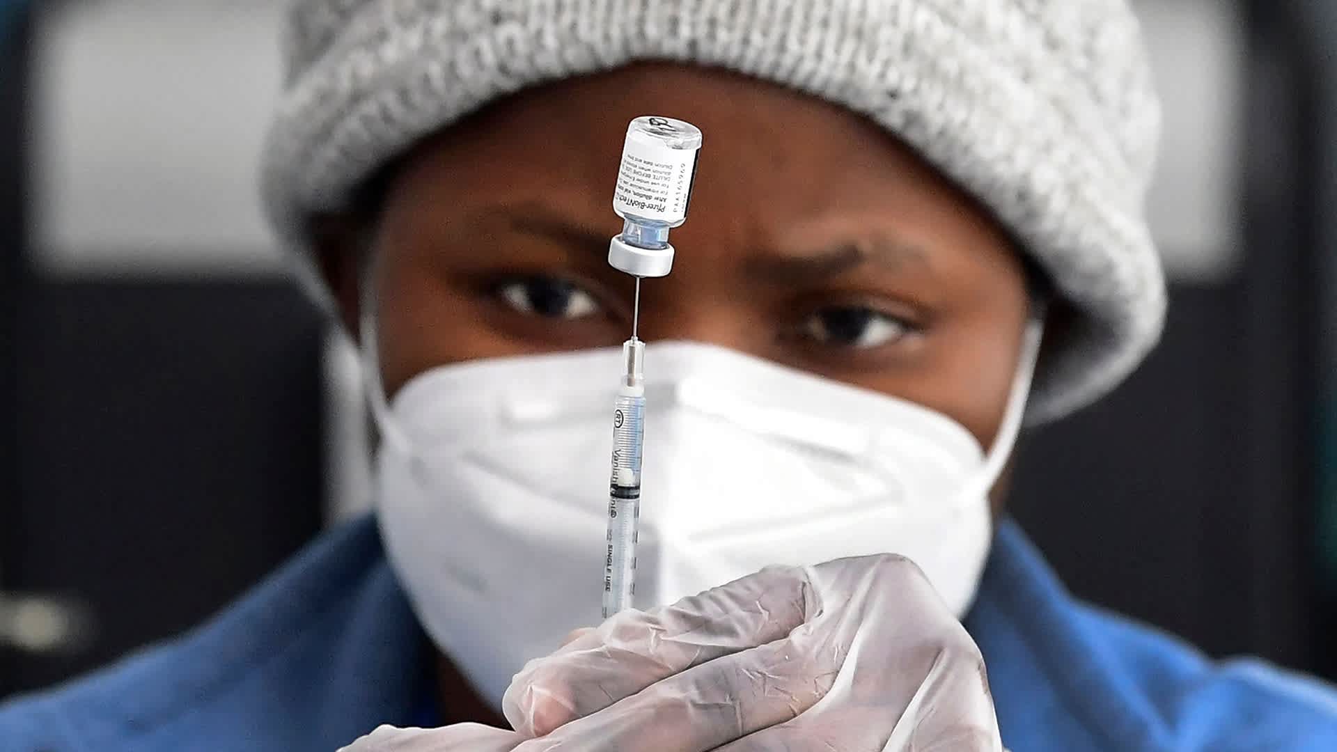 A nurse prepares the Pfizer Covid-19 vaccine a public housing project pop-up site targeting vulnerable communities in Los Angeles, California on March 10, 2021.