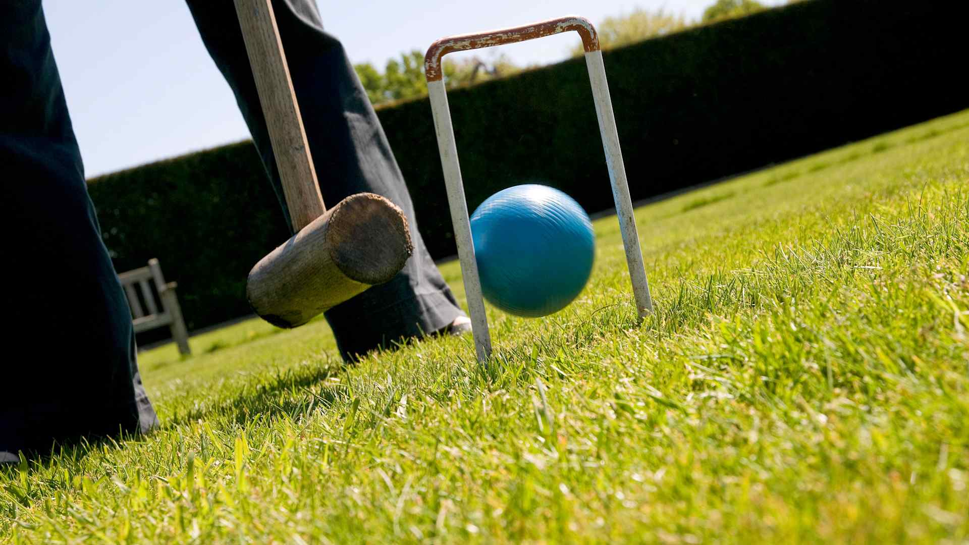 playing croquet on garden lawn, norfolk, england