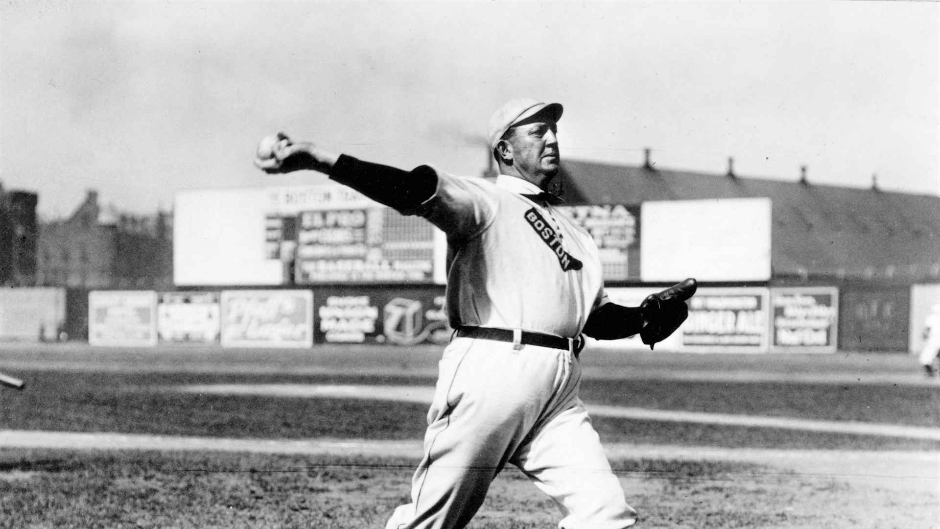 Cy Young, pitcher for the Boston Red Sox, warms up before a game at Huntingdon Ave. Grounds in Boston in 1908.