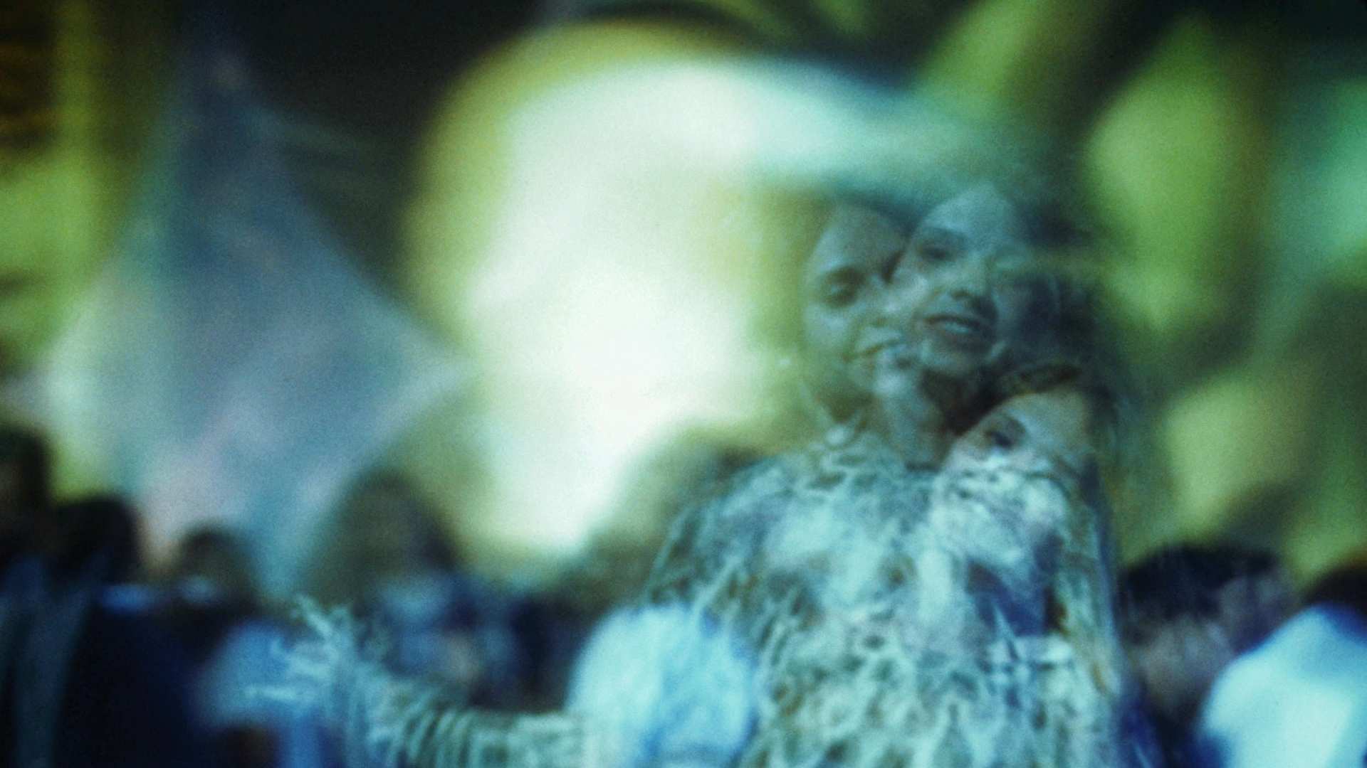 A woman dances in the glow of psychedelic light at Avalon Ballroom in San Francisco.