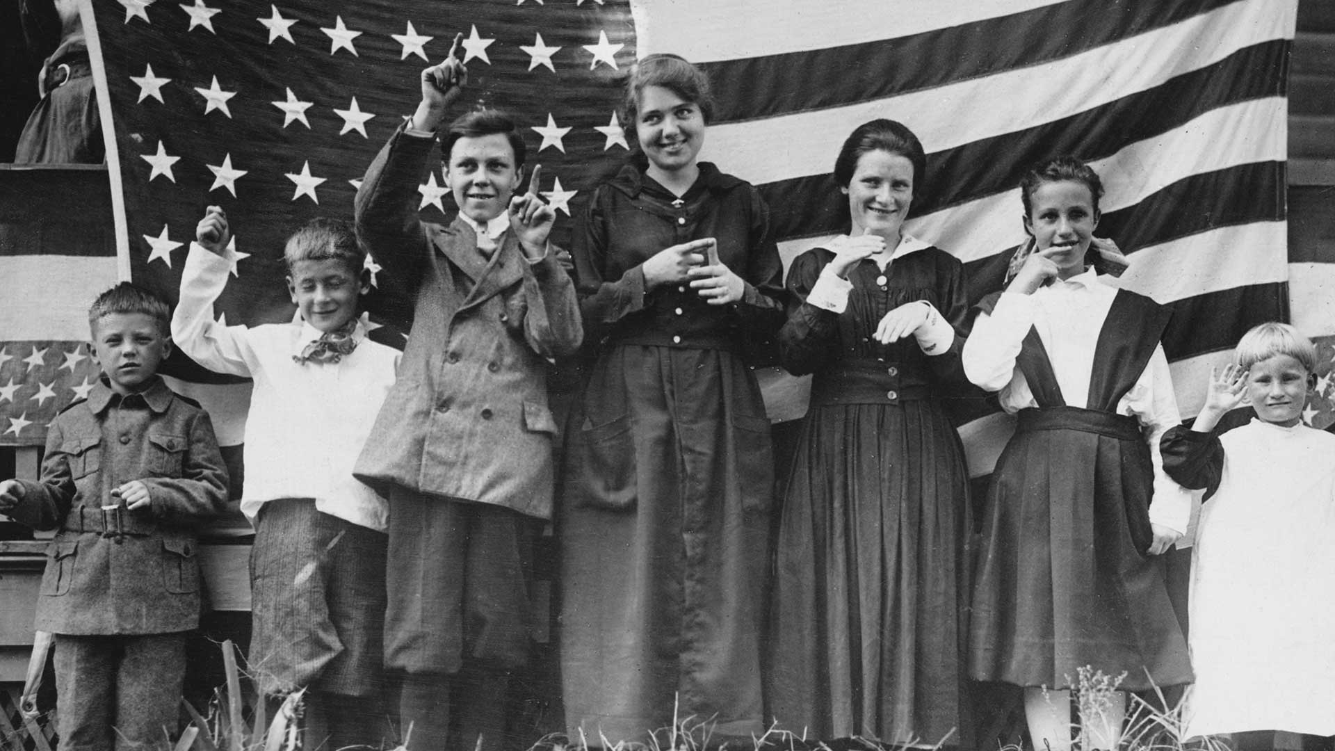 Children using sign language to sing the US national anthem, in Evandale, Ohio, 1935.