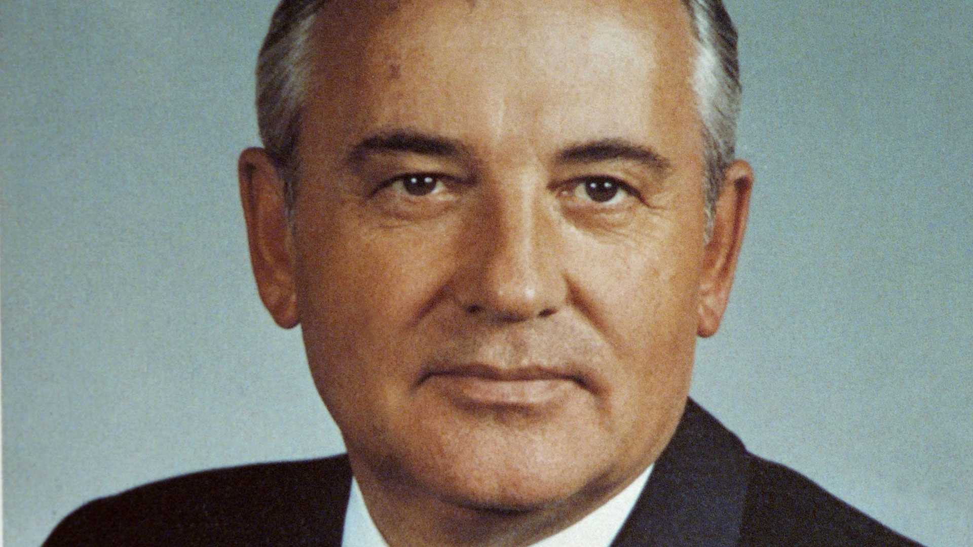 A portrait of Mikhail Gorbachev featured on his book cover, 'Perestroika.'