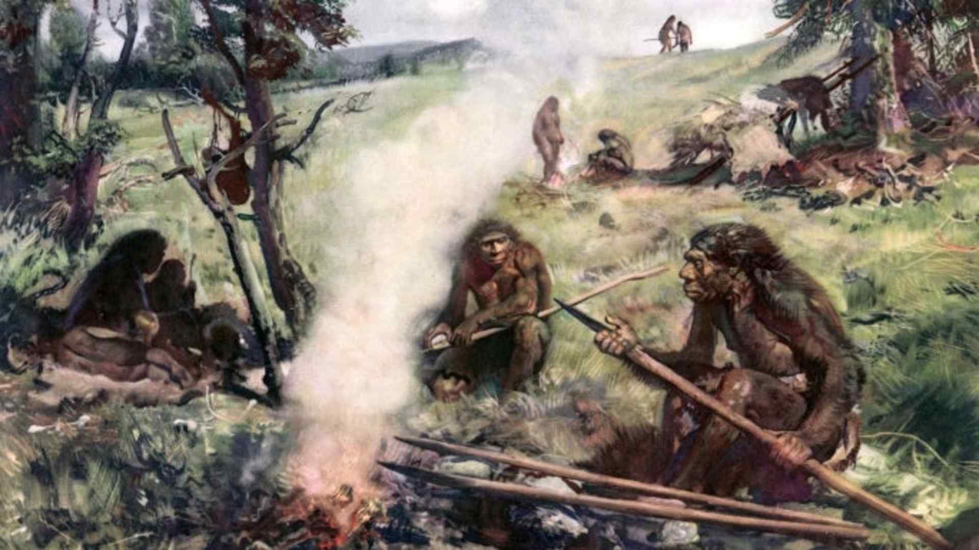 Illustration of Neanderthal man sitting around fire holding lance-like weapon; circa 30,000 BC.  (Photo by Time Life Pictures/Mansell/The LIFE Picture Collection/Getty Images)