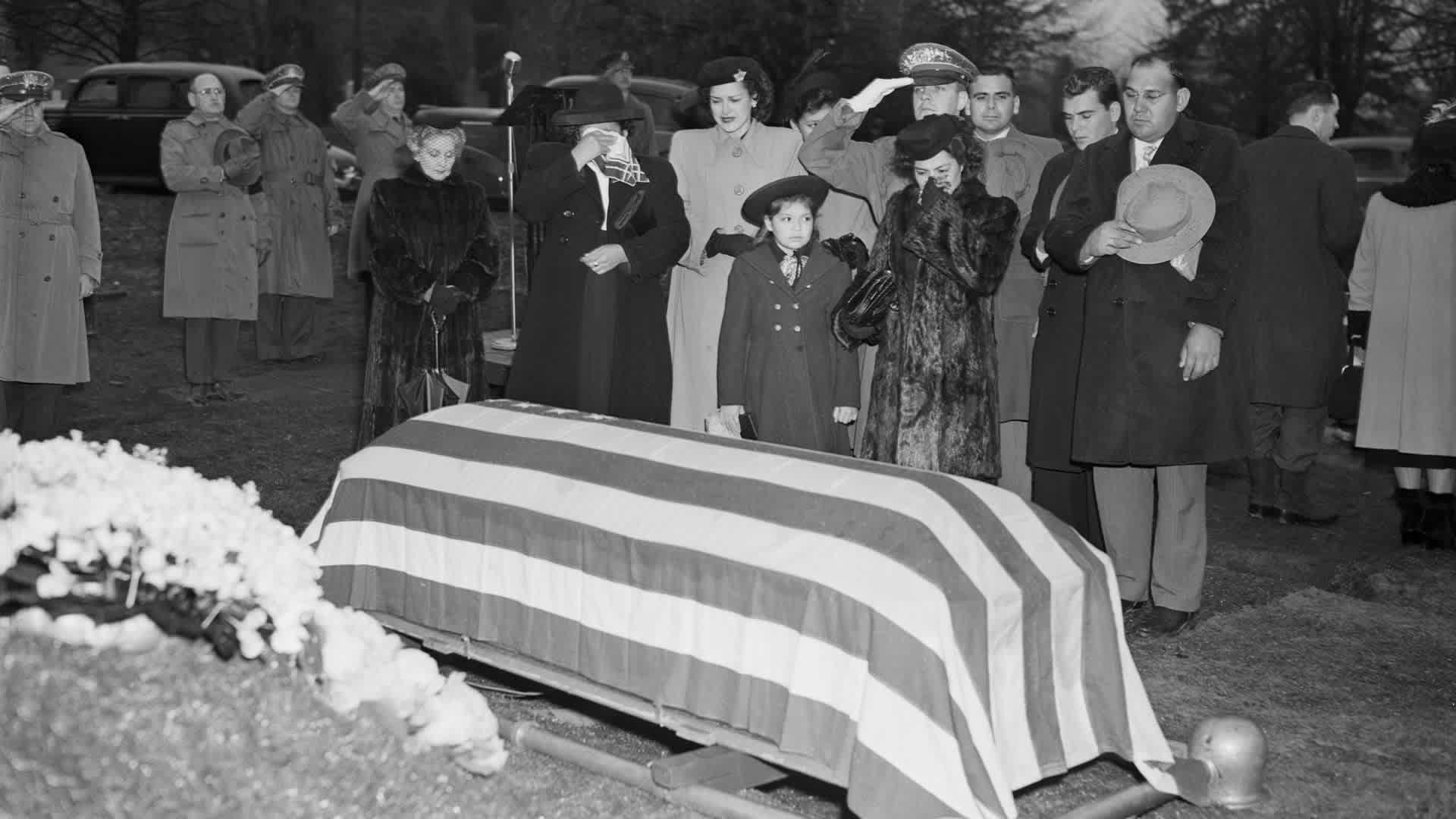 The body of Felix Longoria, a Texas GI of Mexican descent whose family found trouble in paying him final honor in his home town, was buried today in Arlington National Cemetery. Longoria, 26-year-old Mexican-American from Three Rivers, TX, was killed in action in the Philippines. Left to right: Mrs. Guadelupe Longoria, mother; Mrs. Sara Marino, sister-in-law; Adelita the soldier's 8-year-old daughter; Corporate I. Wait, Army ceremonial aide and Mrs. Beatriz Longoria, his widow.