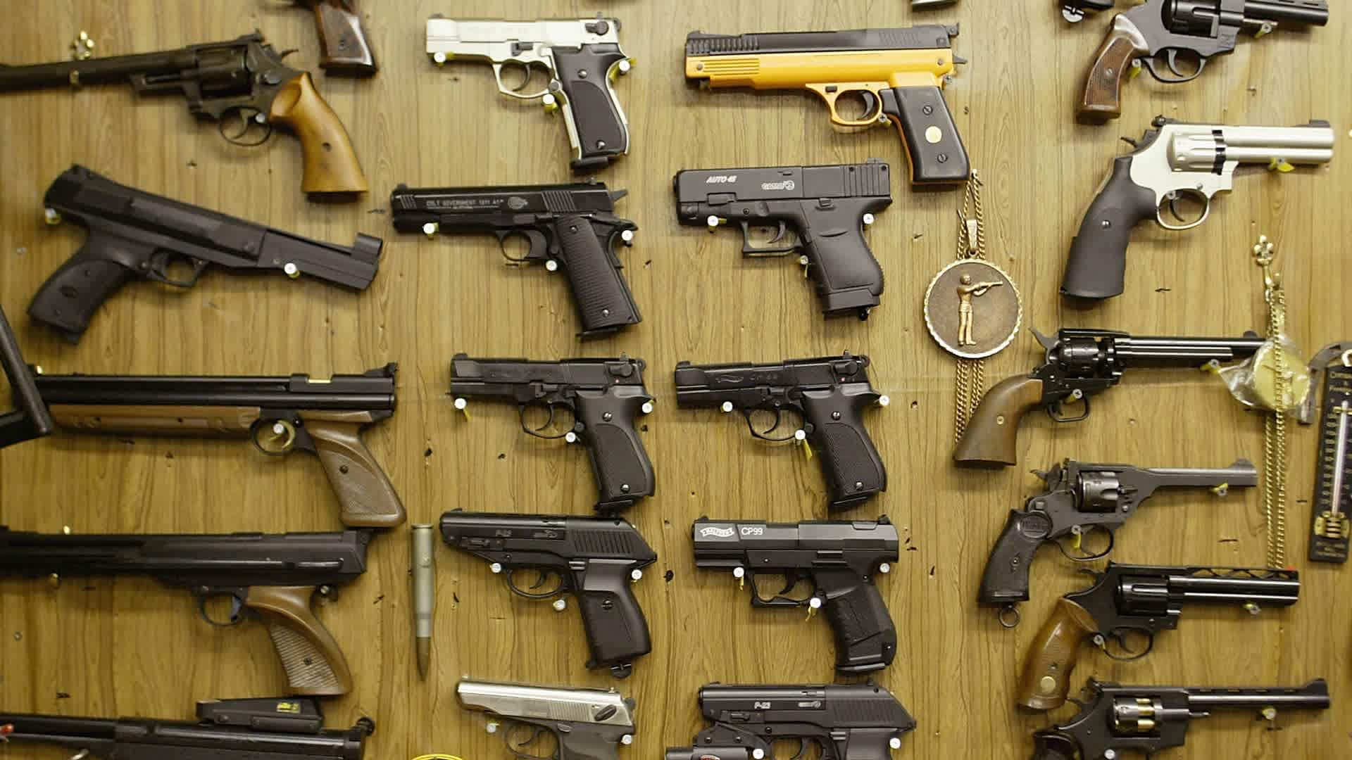 Firearm Laws To Be Tightened In Britain LONDON - JANUARY 6: Airsoft plastic BB guns are on display in a shop selling the hobbyist replica firearms January 6, 2003 in London. British Home Secretary David Blunkett has confirmed plans to tighten firearms laws, which will see a mandatory jail sentence of five years for gun possession. The announcement was made after two teenage girls were killed at a New Year's party in Birmingham but the Government insists it had been planned for some time. Replica and Airsoft guns will not be affected by the new laws. (Photo by Scott Barbour/Getty Images)