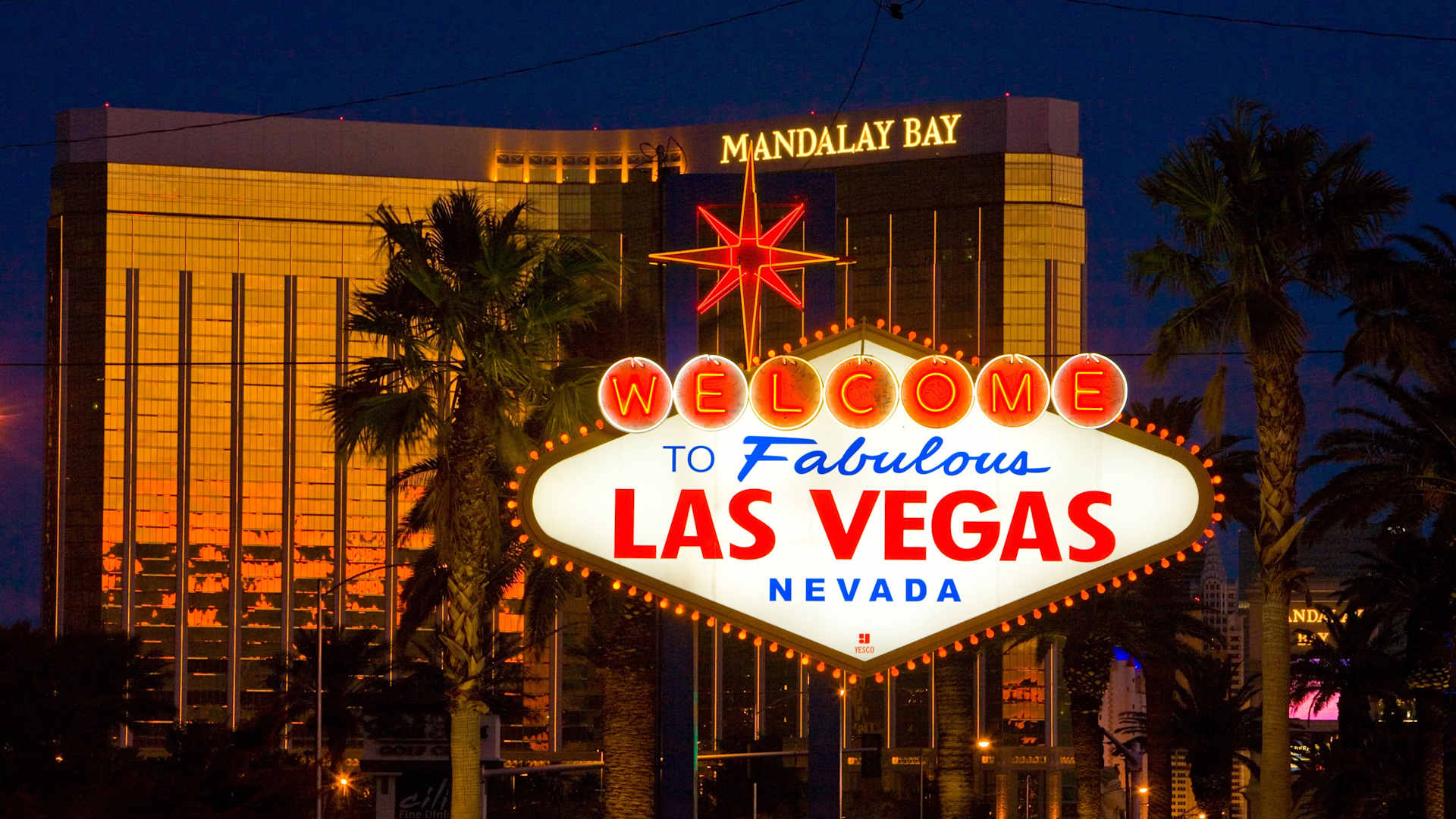 LAS VEGAS, NV - DECEMBER 23: The famous neon "Welcome to Las Vegas" sign at the south entrance to town is viewed in front of the Mandalay Bay Hotel & Casino on December 23, 2010 in Las Vegas, Nevada. Las Vegas, the popular Southwest desert tourist getaway, appears to be making a slow economic recovery following a tough global recession. (Photo by George Rose/Getty Images)