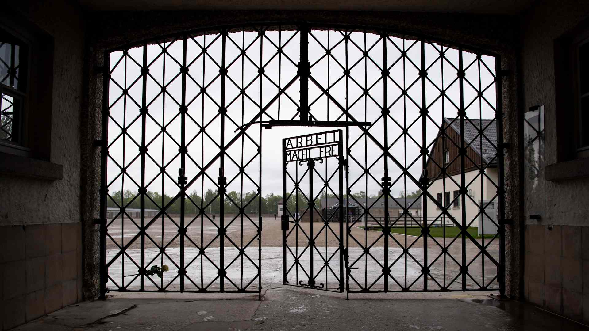 The entrance gate with the inscription "Arbeit macht frei" can be seen at the Dachau concentration camp memorial site. US soldiers liberated more than 30,000 people imprisoned in the camp on April 29, 1945.