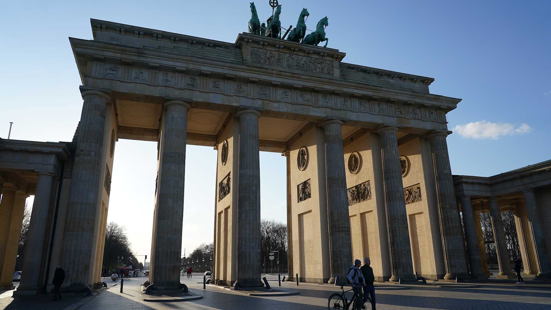 The Brandenburg Gate, a popular landmark and tourist destination, stands nearly devoid of visitors in Berlin, Germany.
