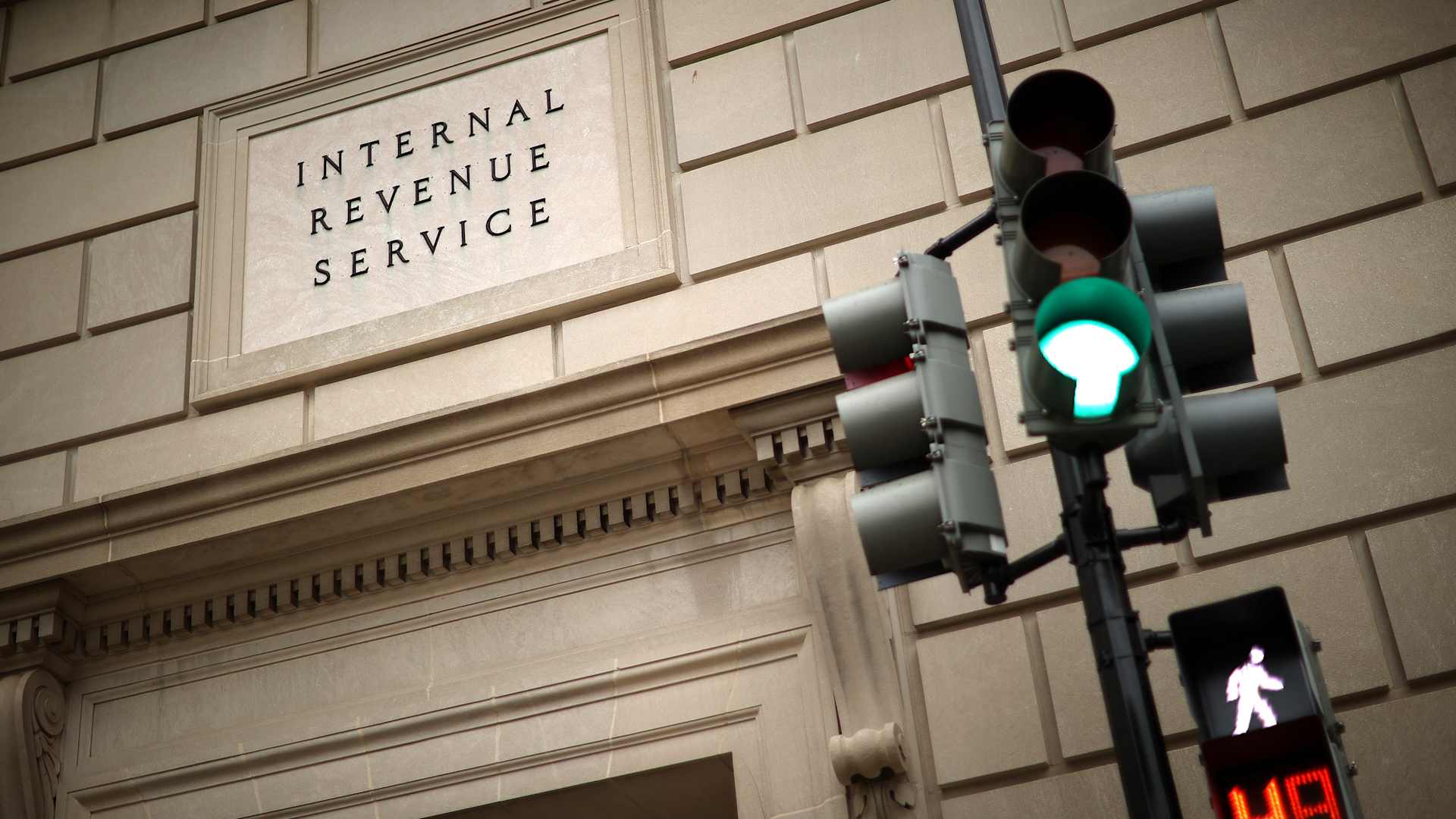 WASHINGTON, DC - APRIL 27: The Internal Revenue Service headquarters building appeared to be mostly empty April 27, 2020 in the Federal Triangle section of Washington, DC. The IRS called about 10,000 volunteer employees back to work Monday at 10 of its mission critical locations to work on taxpayer correspondence, handling tax documents, taking telephone calls and other actions related to the tax filing season. (Photo by Chip Somodevilla/Getty Images)
