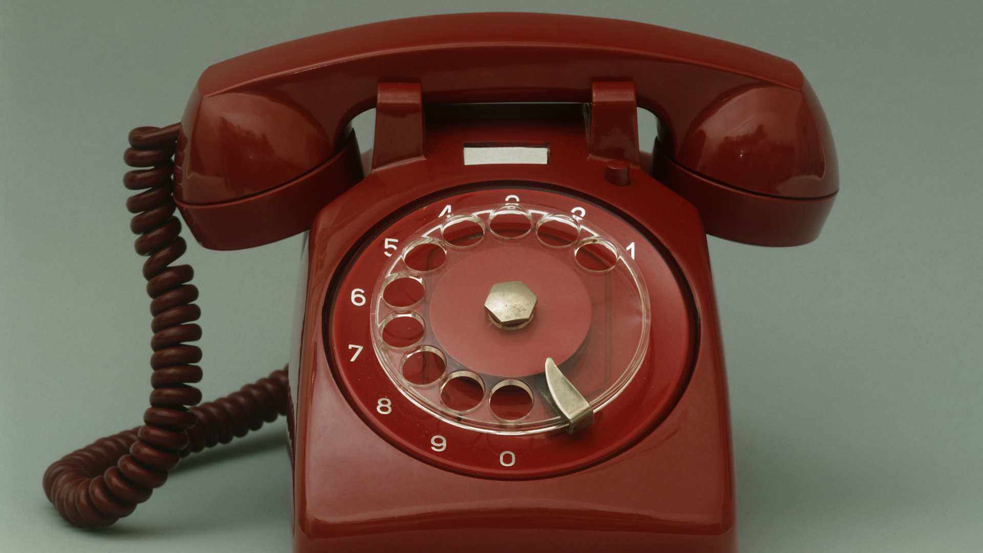 A red hotline telephone.