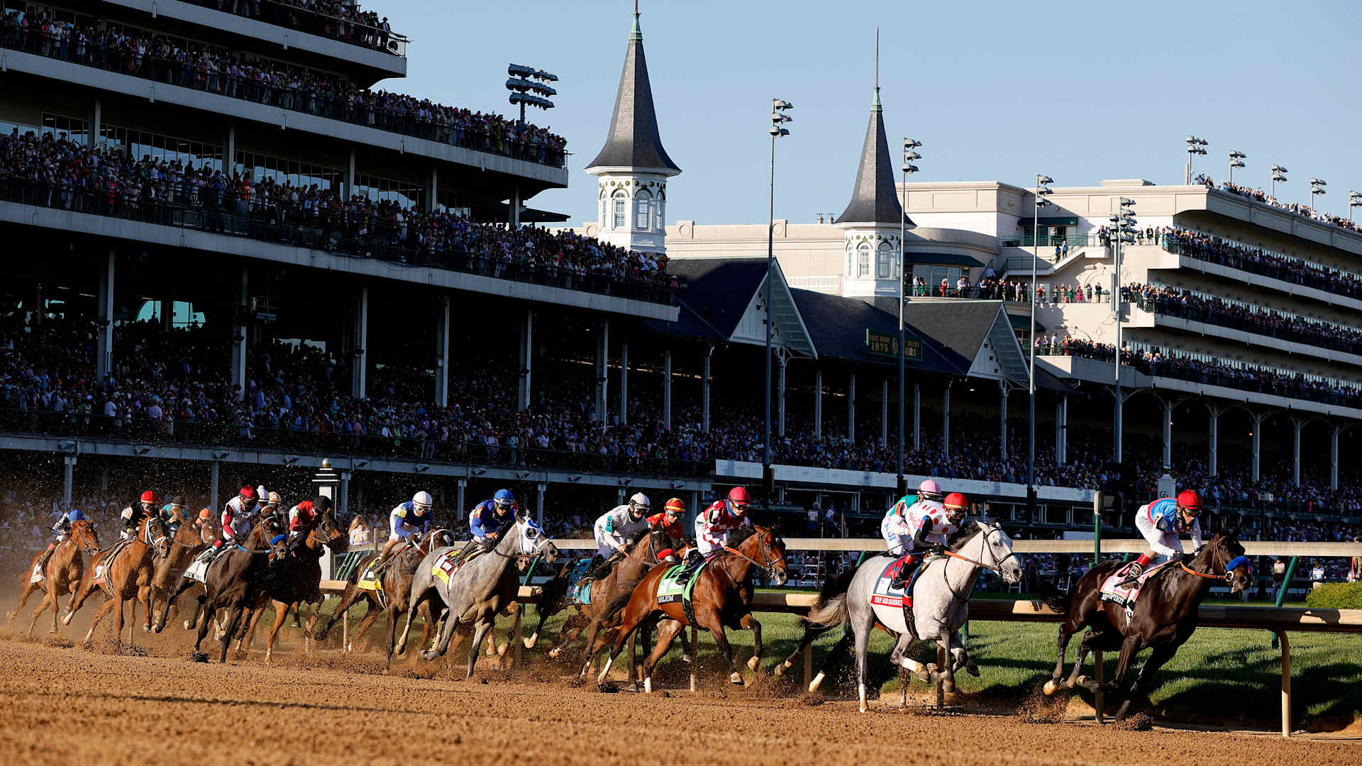 LOUISVILLE, KENTUCKY - MAY 01: Medina Spirit #8, ridden by jockey John Velazquez, leads the field around the first during the 147th running of the Kentucky Derby at Churchill Downs on May 01, 2021 in Louisville, Kentucky. (Photo by Sarah Stier/Getty Images)