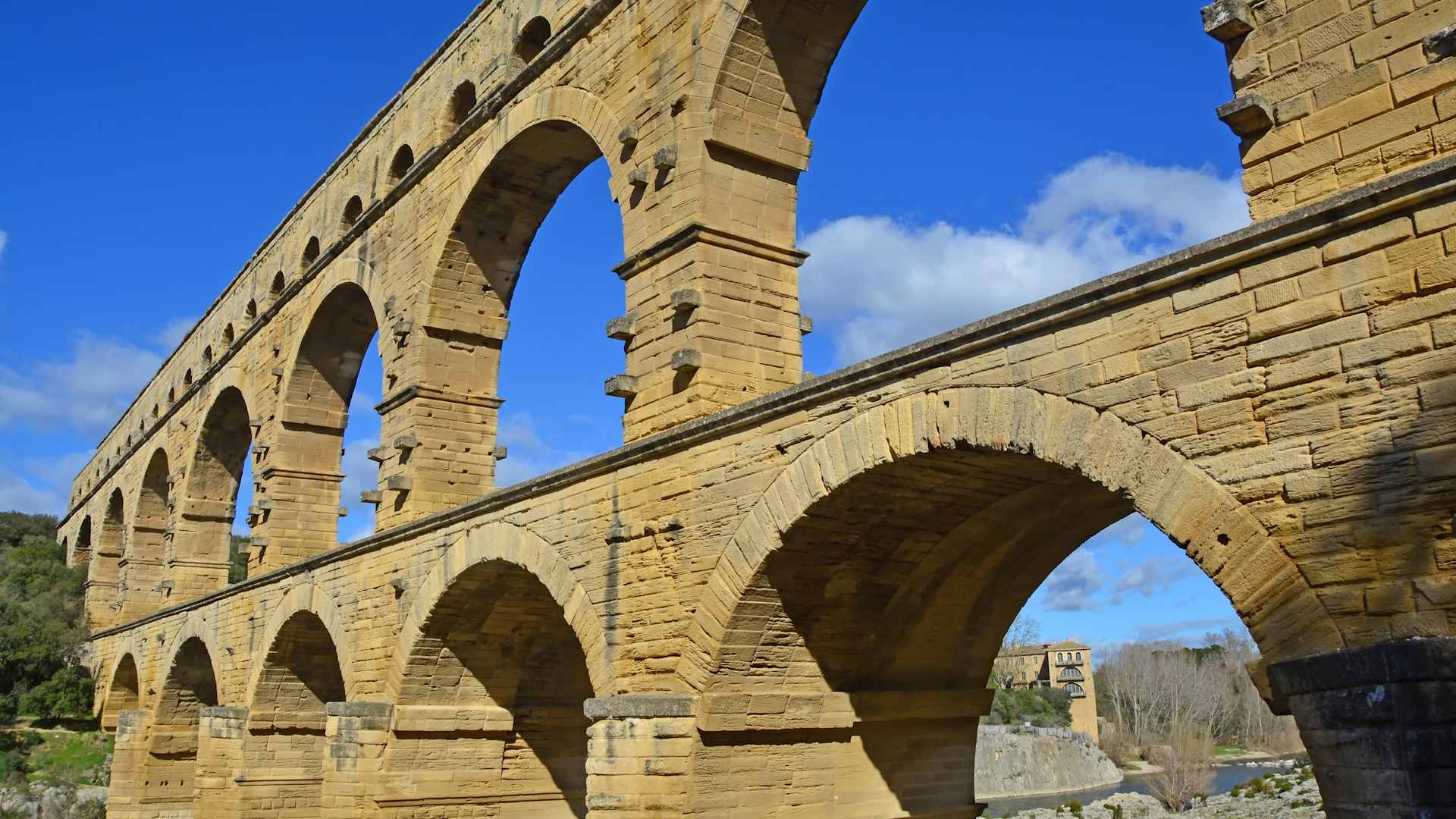 The Ancient Roman Pont du Gard aqueduct and viaduct bridge over the River Gardon, the highest of all ancient roman bridges, near to Nimes in the South of France. (Photo by: Dukas/Universal Images Group via Getty Images)