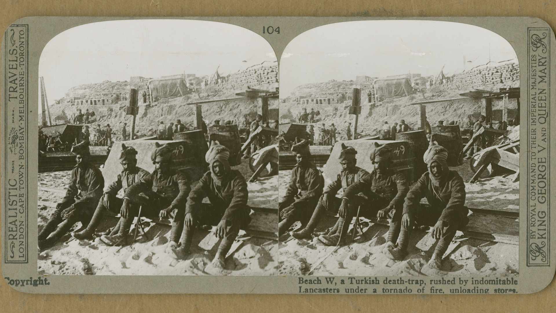 A stereoscopic image of Indian troops on W Beach on Cape Helles, where stores are being unloaded during the Gallipoli Campaign, Gallipoli peninsula, Turkey, World War I, 1915.