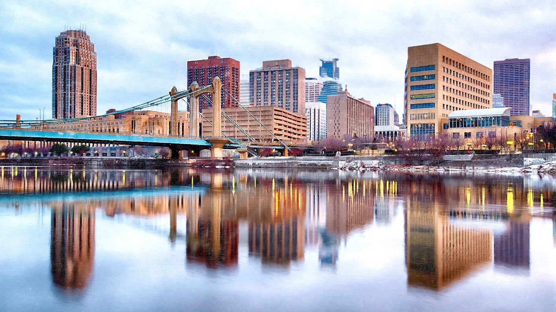 Minneapolis Downtown with Hennepin Avenue Bridge at Minnesota USA. Painterly look to downtown.