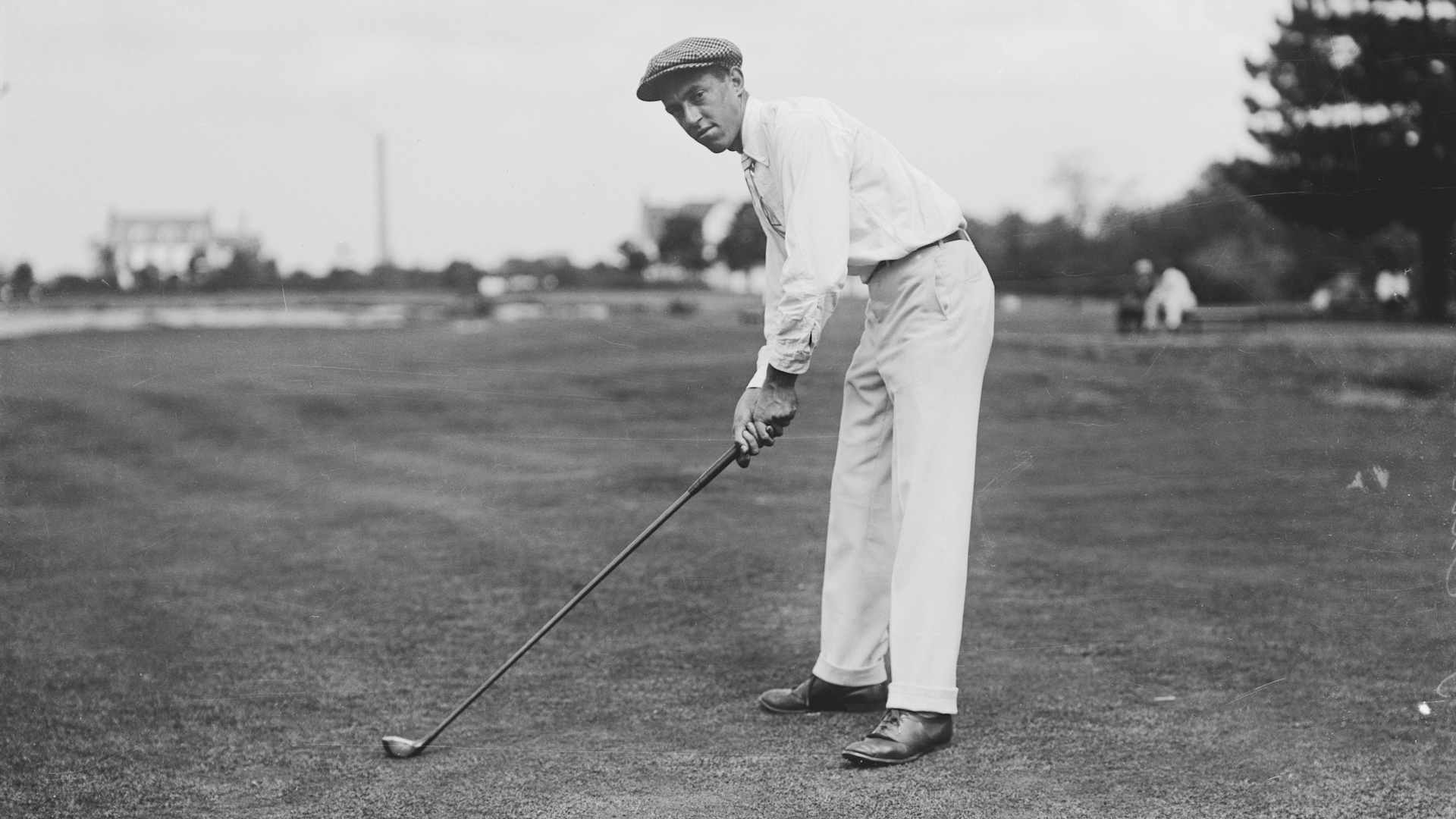American golfer Francis Ouimet, (1893-1967), posing in a driving stance. Ouimet was the first winner of the U. S. Open.