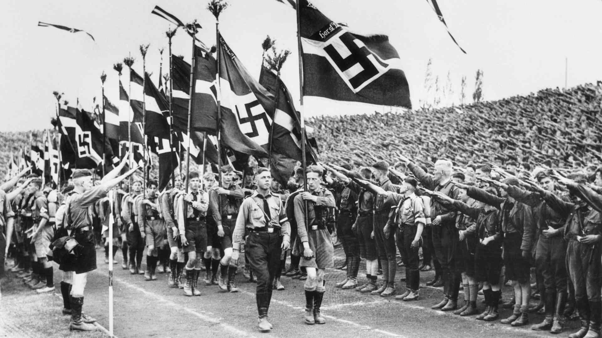 Young Nazis Saluting During March, 1934