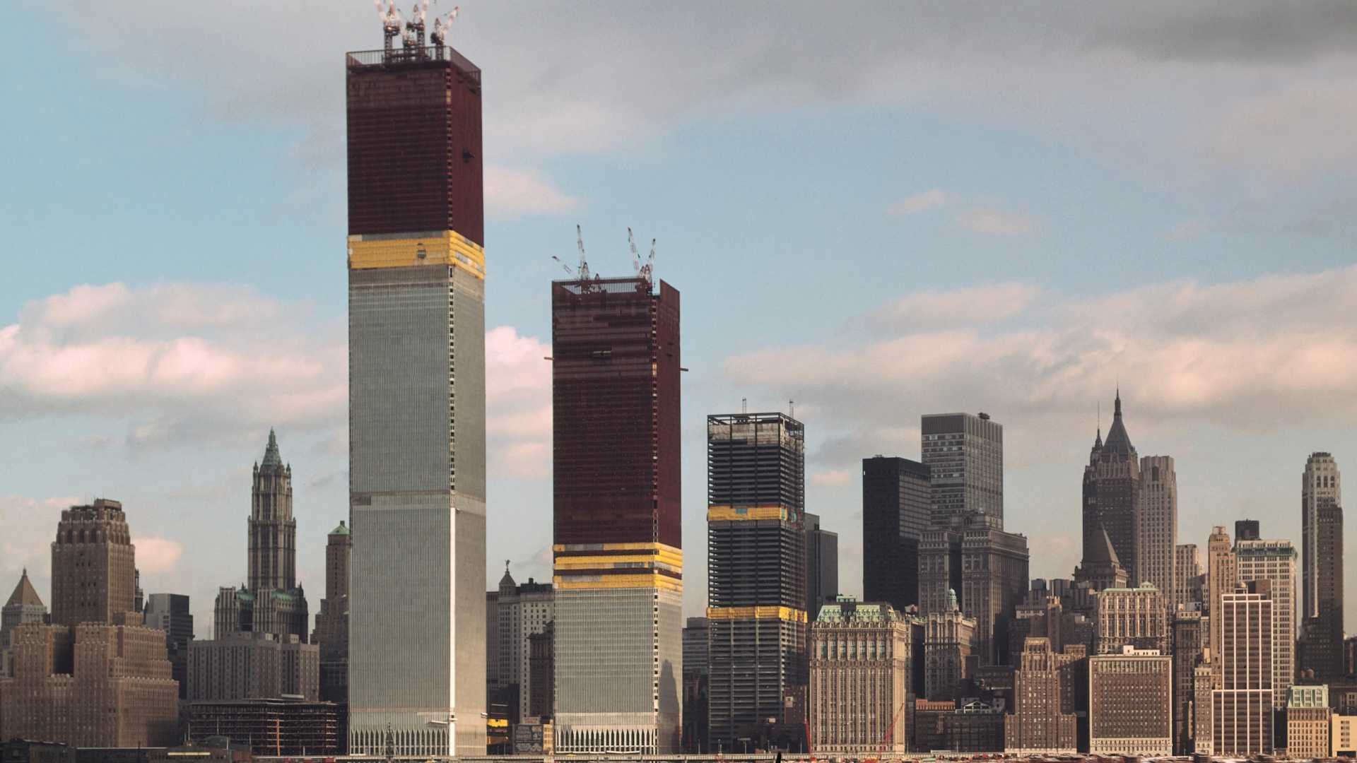 New York: Views of the World Trade Center (both of its twin towers still under construction) and Manhattan skyline views taken from New Jersey shore.