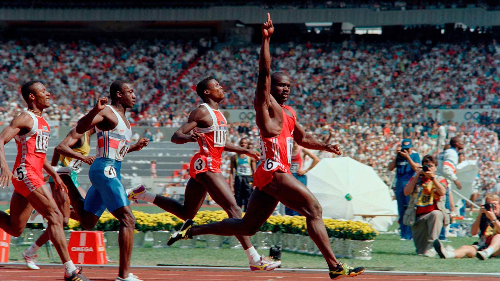 Ben Johnson crosses the finish line to win the Olympic 100-meter final in a world record 9.79 seconds on September 24, 1988, at Seoul Olympic Stadium.