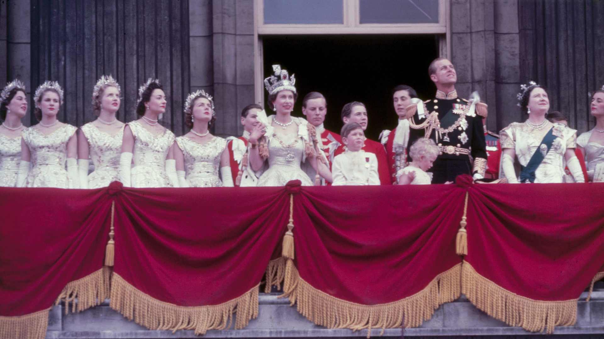 Queen Elizabeth II on the balcony at Buckingham Palace after her coronation, 2nd June 1953. With her are (left to right) : Prince Charles, Princess Anne, Prince Philip, Duke of Edinburgh and Queen Elizabeth The Queen Mother. (Photo by Fox Photos/Hulton Archive/Getty Images)