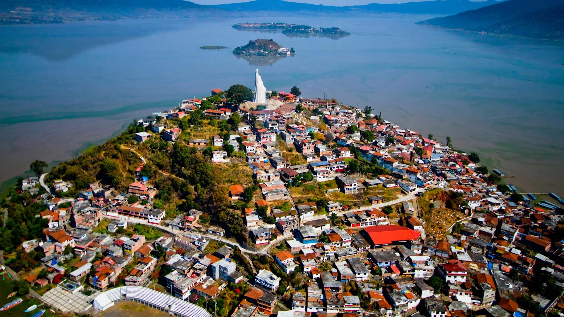 Aerial shot taken from an ultra-light aircraft of the lake Patzcuaro in the state of Michoacan, Mexico. The island in the middle is called Janitzio, and is the theater of amazing indigenous festivities for the day of the dead.