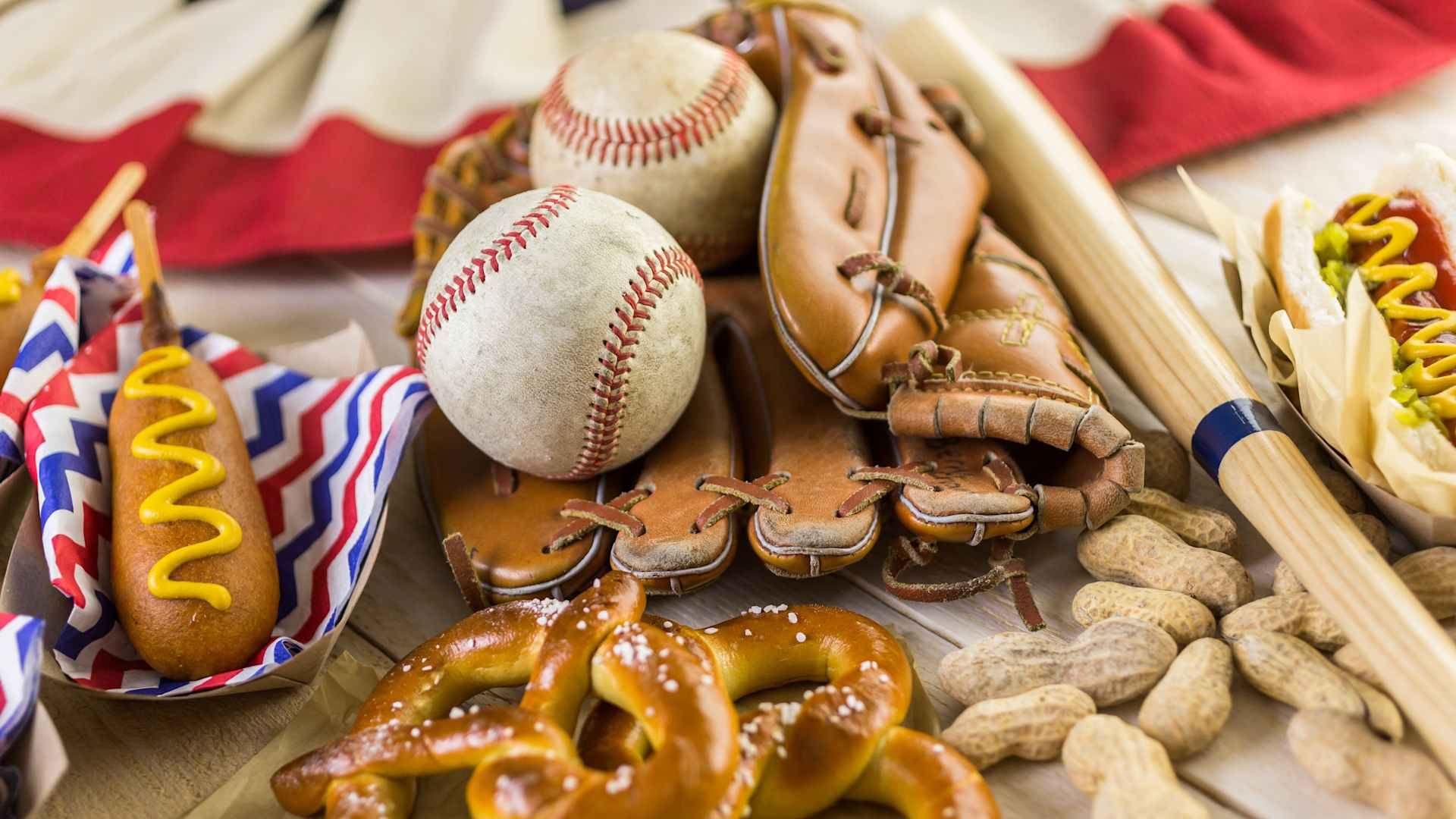 Baseball party food with balls and glove on a wood table.