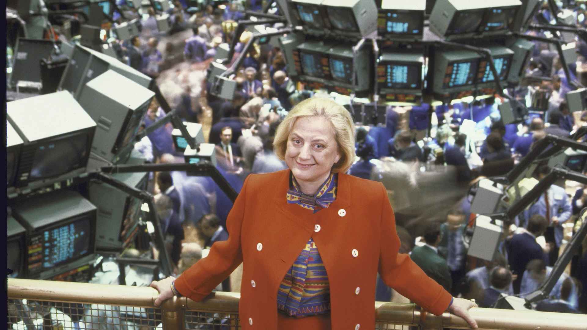 Muriel Siebert, first female head of a brokerage firm, above the floor of the NY Stock Exchange.