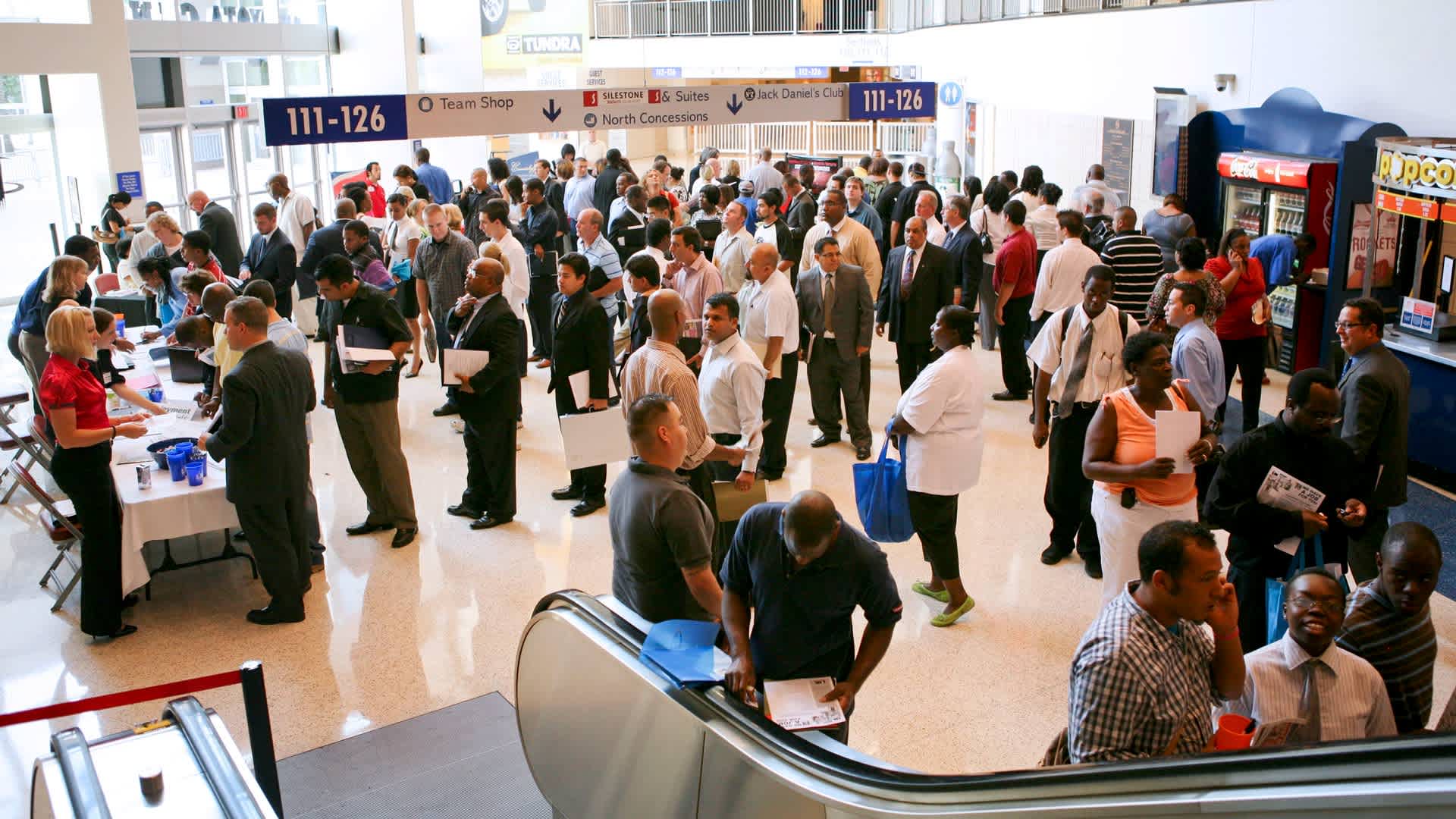 Job seekers attend a career fair at the Toyota Center in HouUNITED STATES - AUGUST 05: Job seekers attend a career fair at the Toyota Center in Houston, Texas, U.S., on Wednesday, Aug. 5, 2009. The pace of U.S. job losses slowed more than expected last month and the unemployment rate dropped for the first time since April 2008, the clearest signs yet that the worst recession since the Great Depression is easing. (Photo by Scott Dalton/Bloomberg via Getty Images)