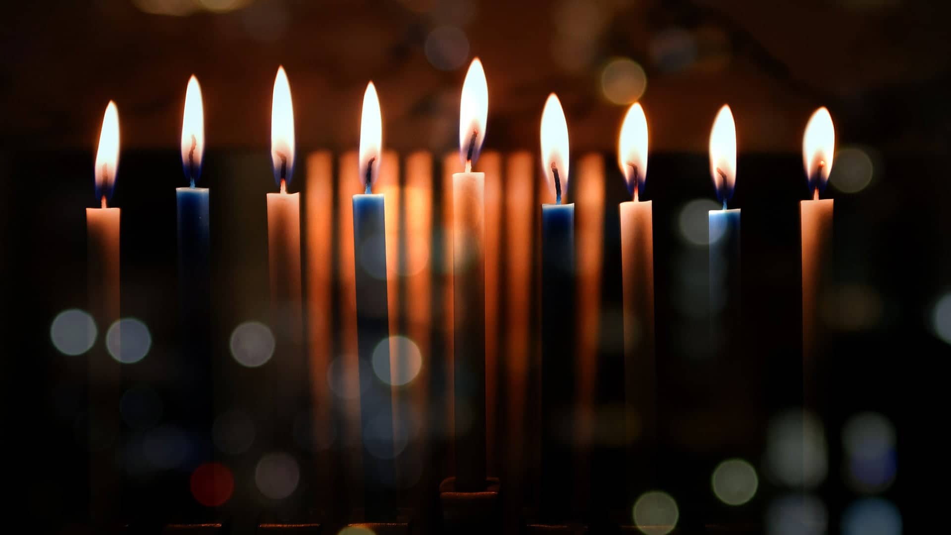 Lit candles in a menorah.