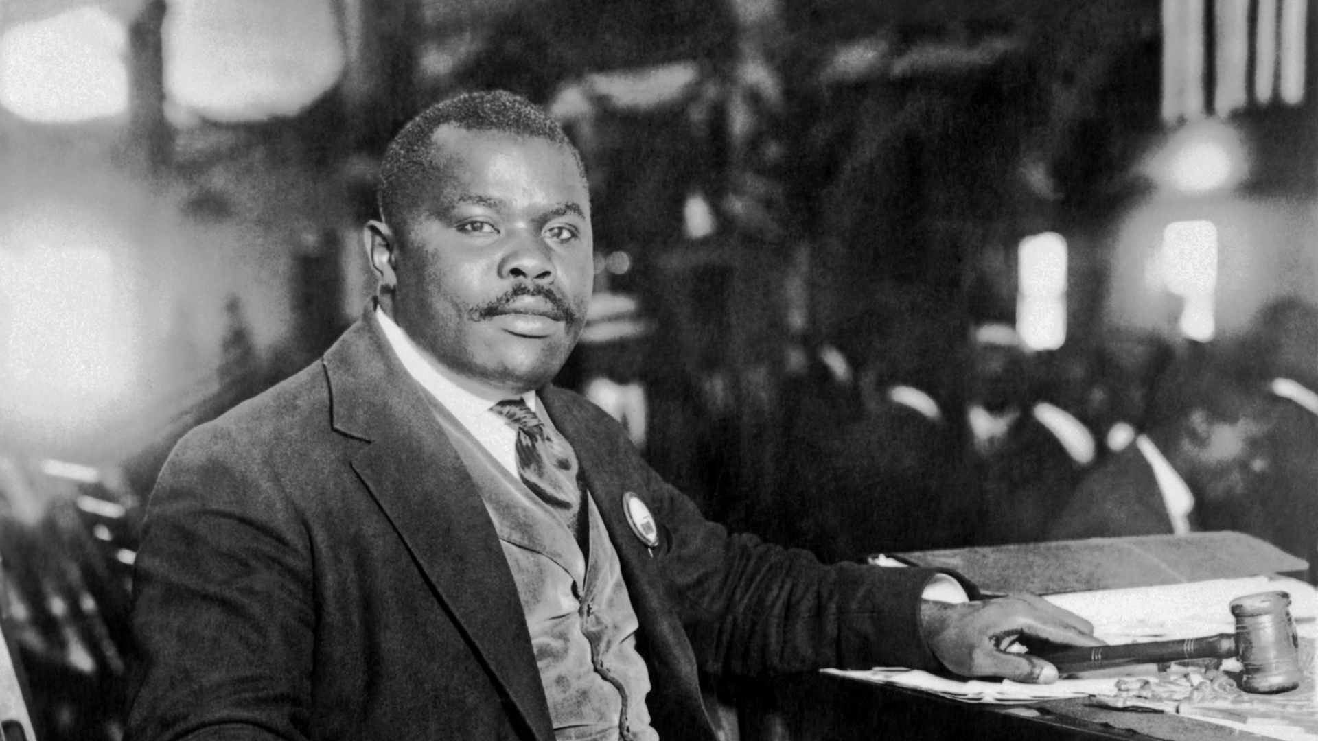 Marcus Garvey seated at his desk, August 5, 1924.