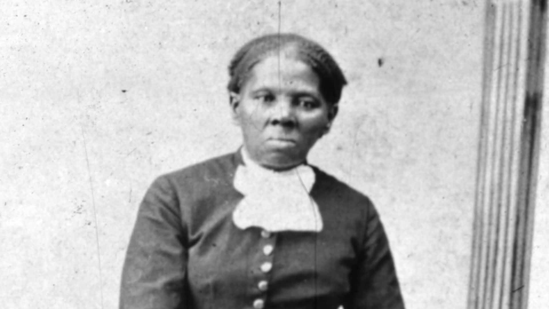 Photograph of seated American abolitionist leader Harriet Tubman, who escaped slavery and led many other enslaved people to freedom using the abolitionist network known as the Underground Railroad. 