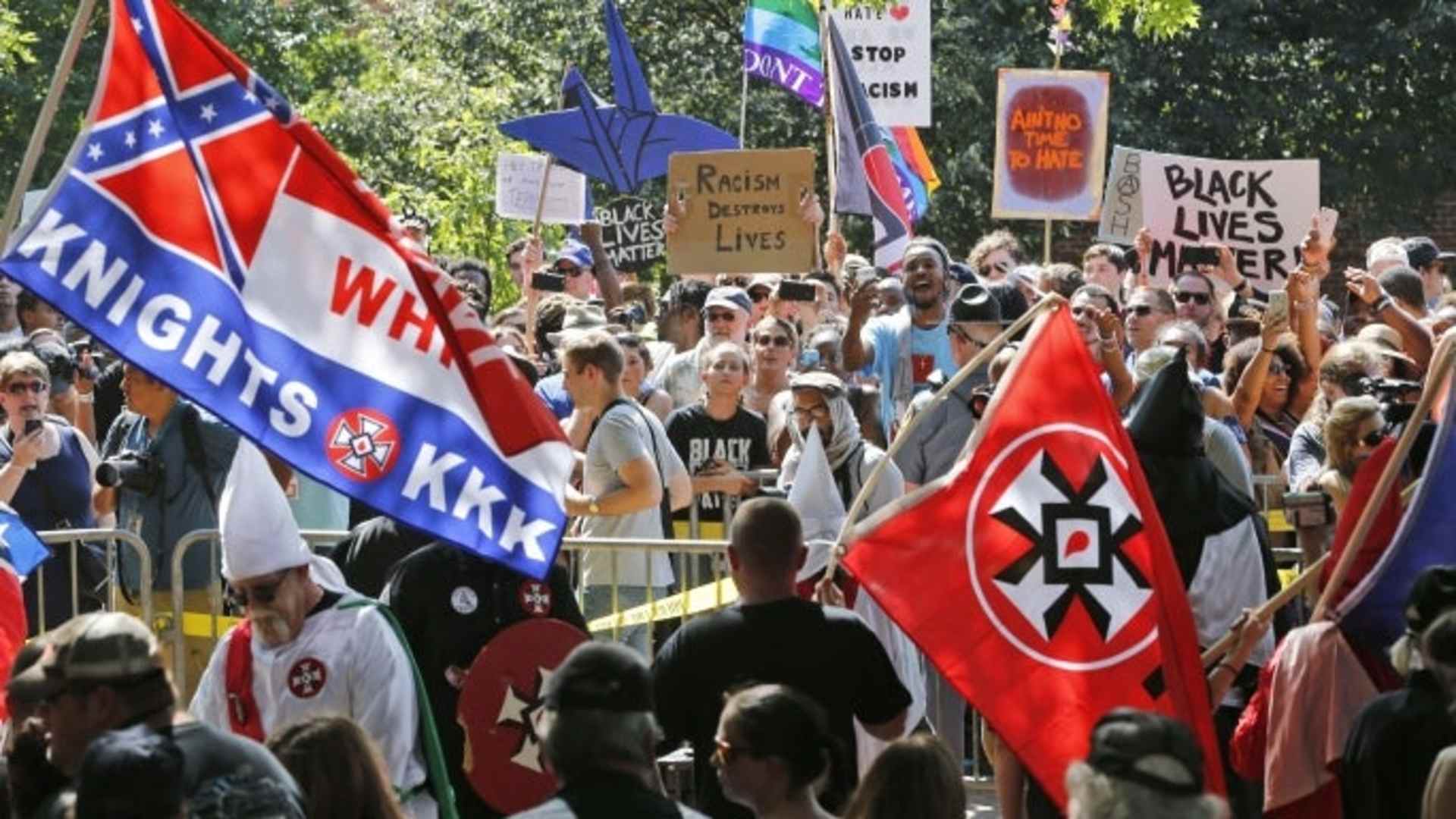 A large group of protesters demonstrate against a KKK rally in Justice Park, in Charlottesville, Virginia, 2017. (Credit: AP/REX/Shutterstock)