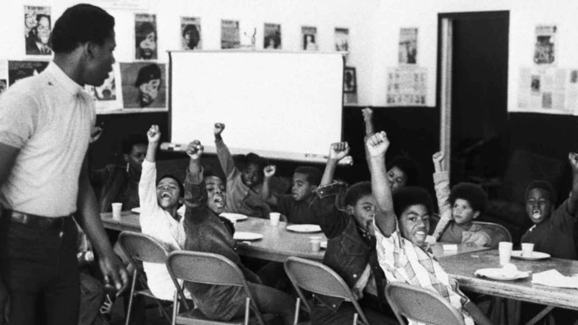 A teacher and his at a Black Panther liberation school. (Credit: Bettmann Archive/Getty Images)
