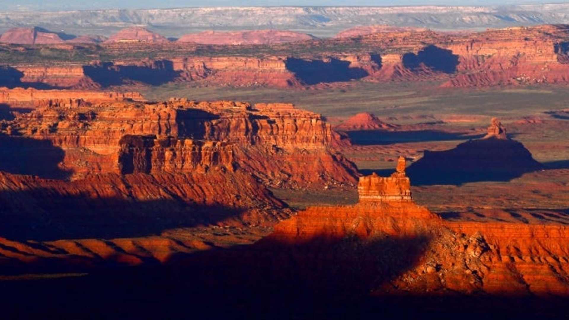 The sun sets over Valley of the Gods in Bears Ears National Monument seen from the Moki Dugway June 11, 2017 north of Mexican Hat, UT.