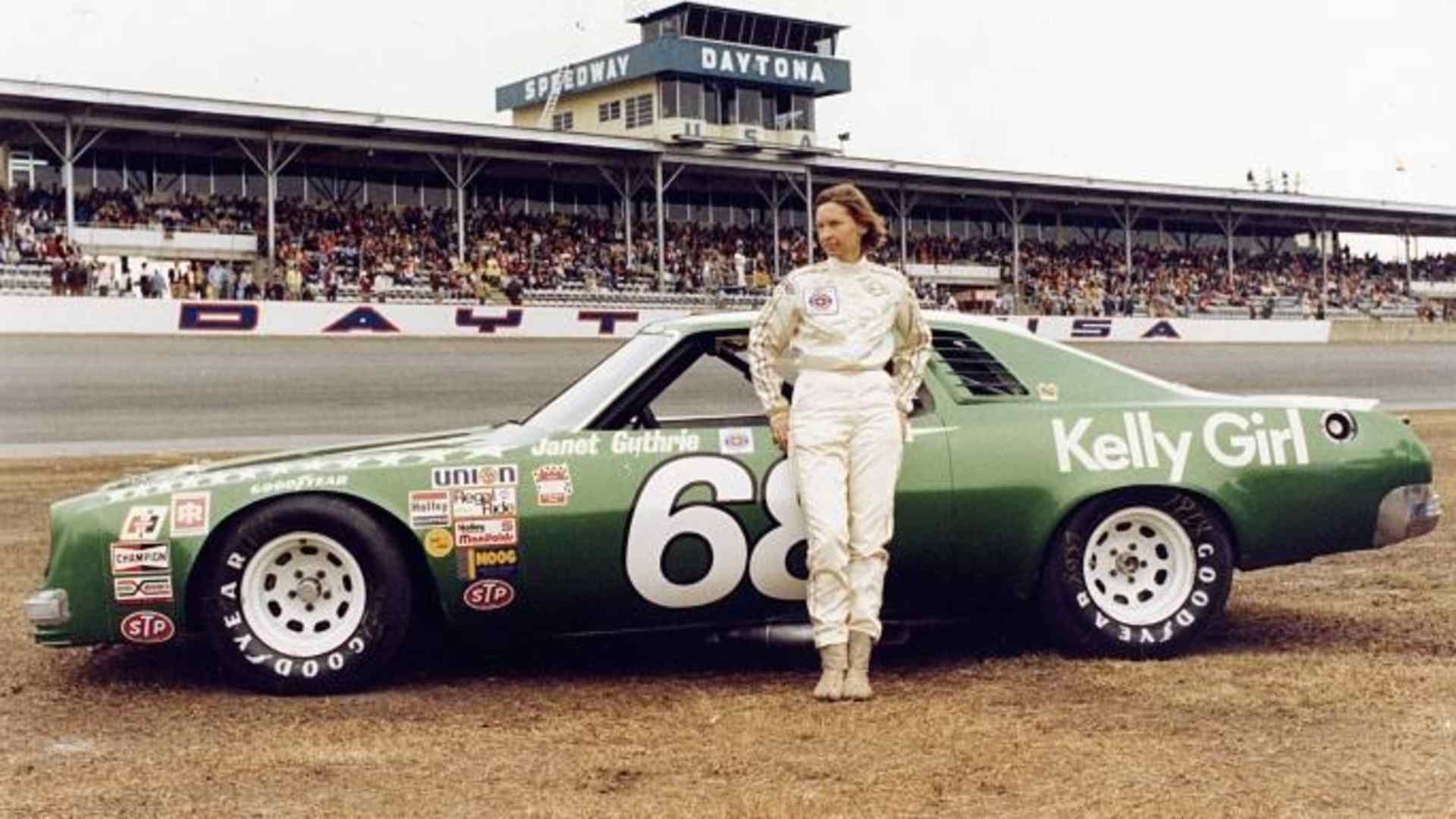 Janet Guthrie #68 stands in front of her car before the 1977 Winston Cup Daytona 500 on February 20, 1977.