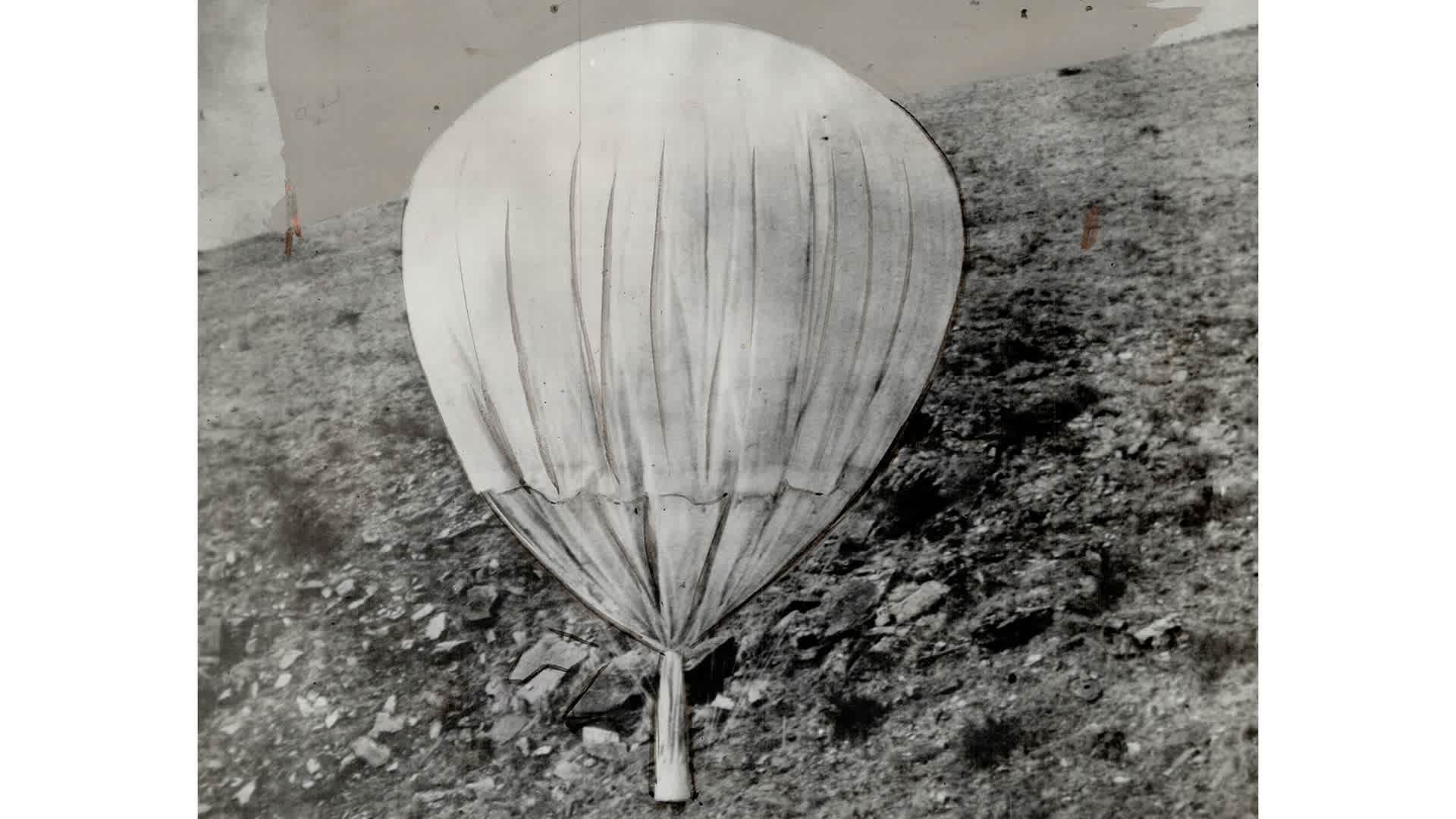 A Japanese balloon in the air over North America is this one. This balloon bomb; like the Nazi robomb; carries a charge of explosive without pilot.