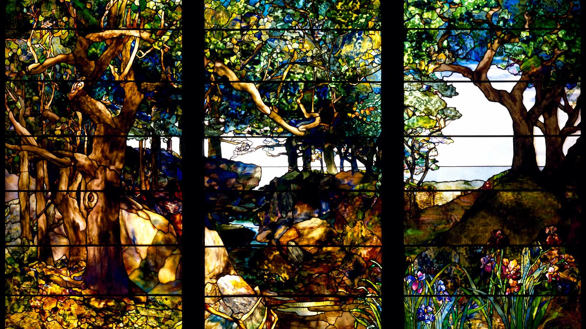 Louis Comfort Tiffany (American, 1848–1933), A Wooded Landscape in Three Panels, c. 1905, stained glass, 219.7 x 334.1 cm (86.5 x 131.6 in), Museum of Fine Arts, Houston, Texas.