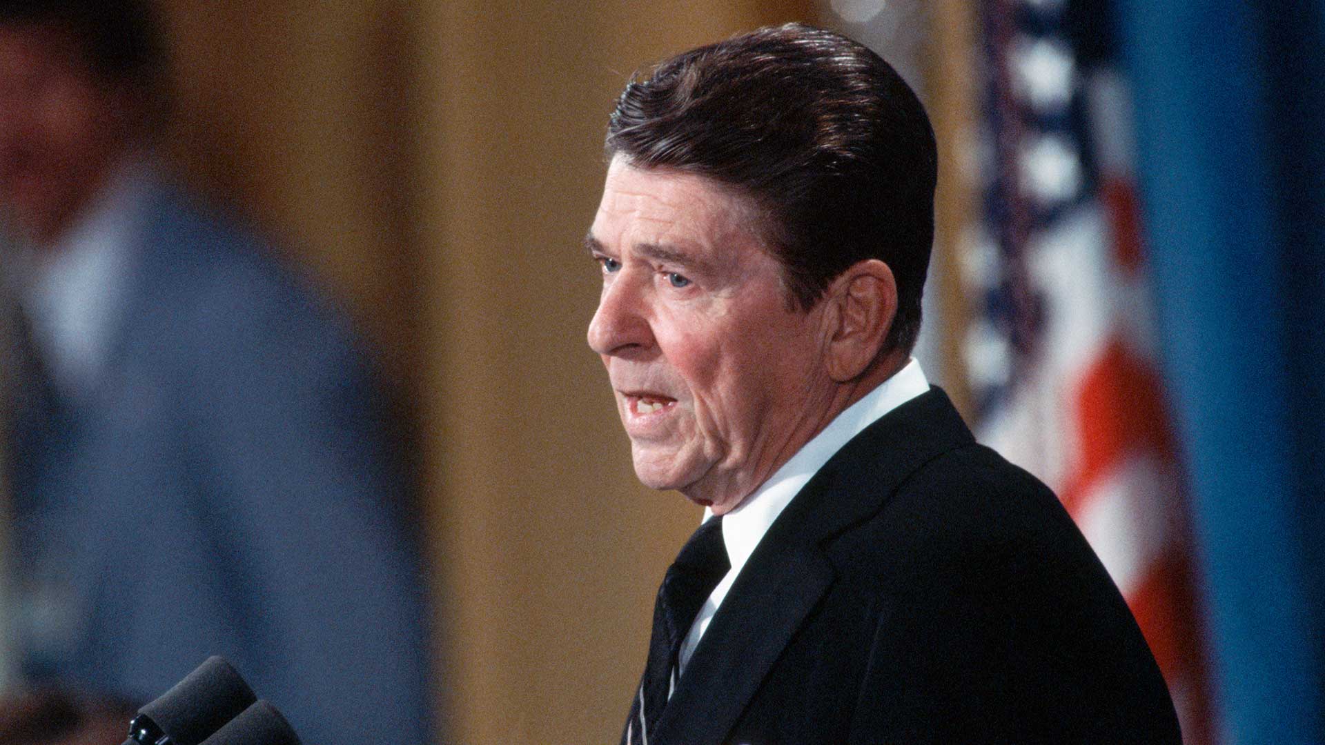 President Ronald Reagan answers a reporter's question during a White House news conference in 1980.