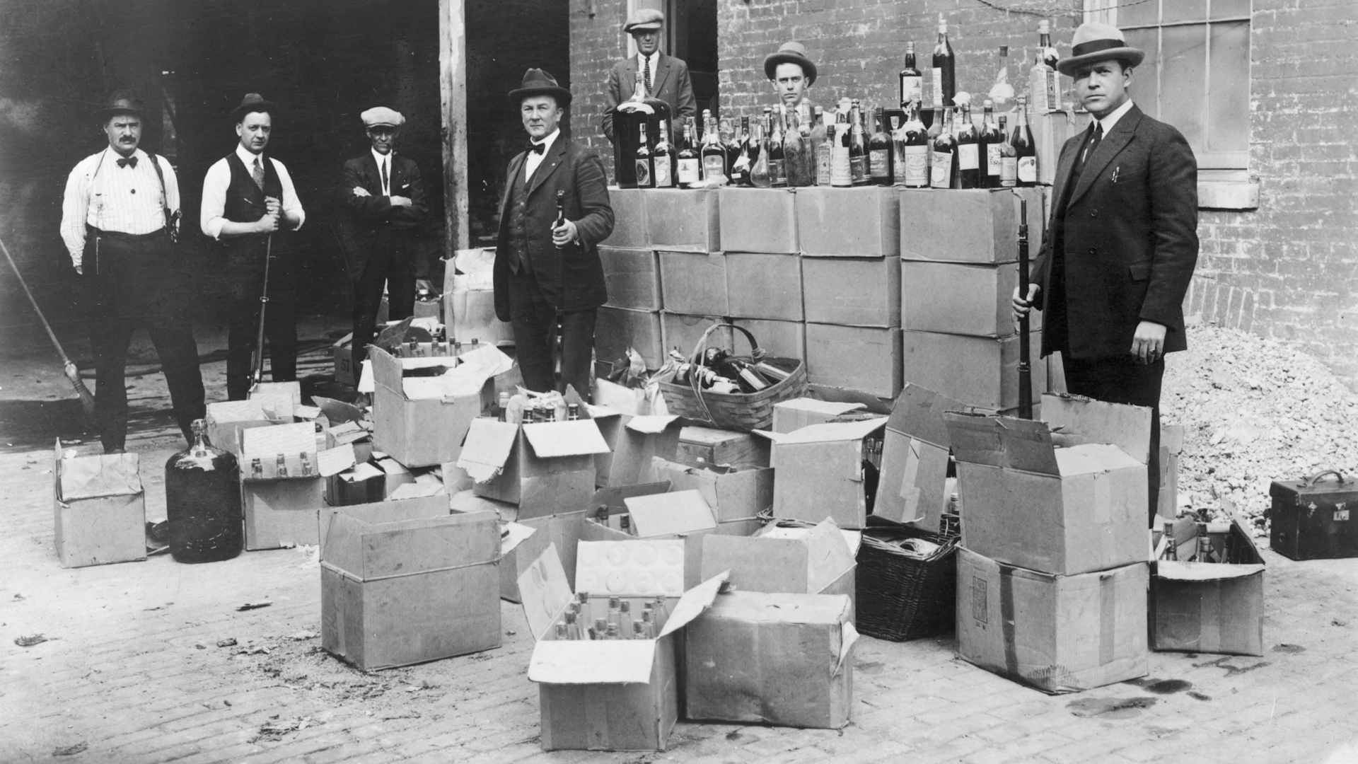 Revenue agents during raid on a speakeasy, Prohibition period. Photo, Washington, April 25, 1923.