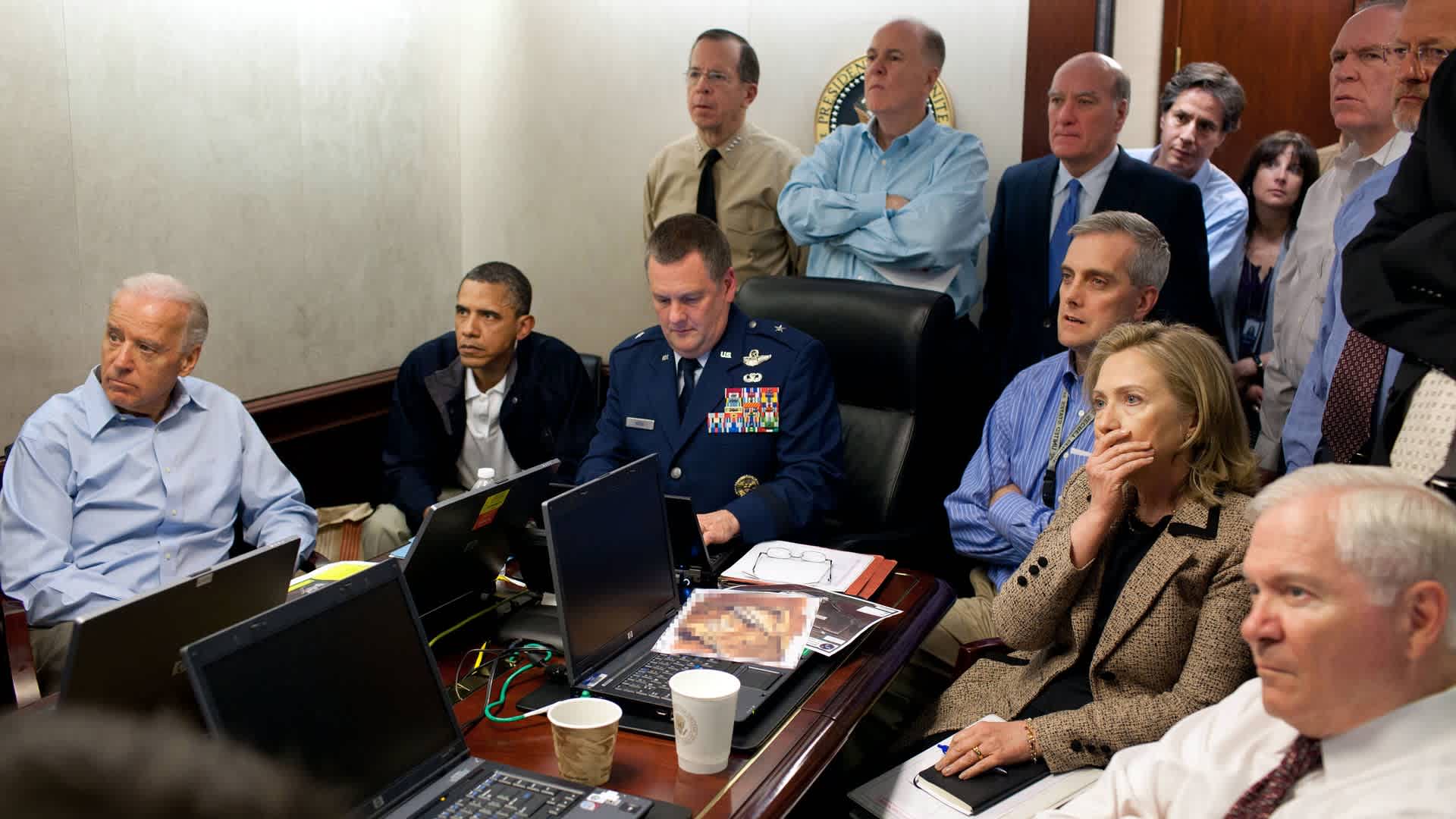President Barack Obama, Vice President Joe Biden, Secretary of State Hillary Clinton and members of the national security team receive an update on the mission against Osama bin Laden in the Situation Room of the White House May 1, 2011, Washington, D.C.