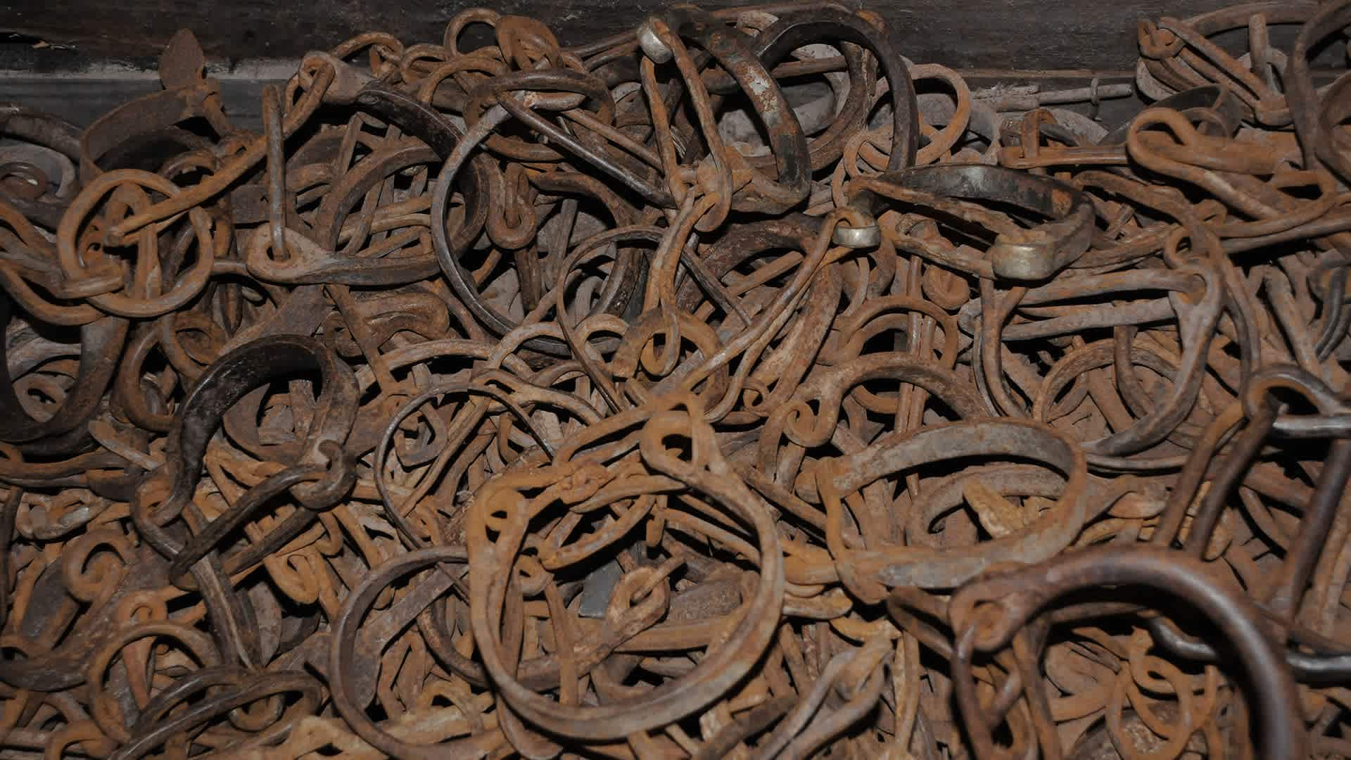 Leg irons once used on enslaved people on display at the Kura Hulanda Museum on the Caribbean island of Curaçao.