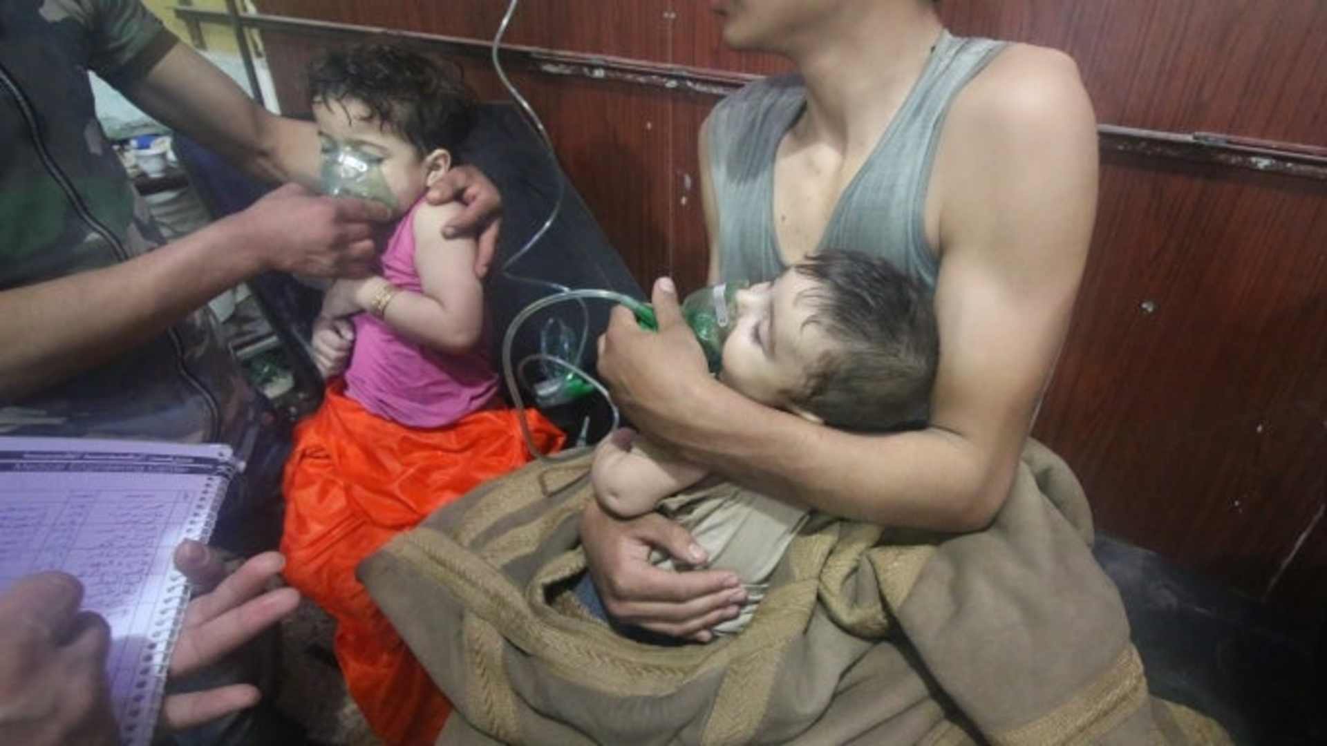 Syrian children receiving medical treatment after a poisonous gas attack in Eastern Ghouta, Damascus, April 7, 2018. (Credit: Halil el-Abdullah/Anadolu Agency/Getty Images)